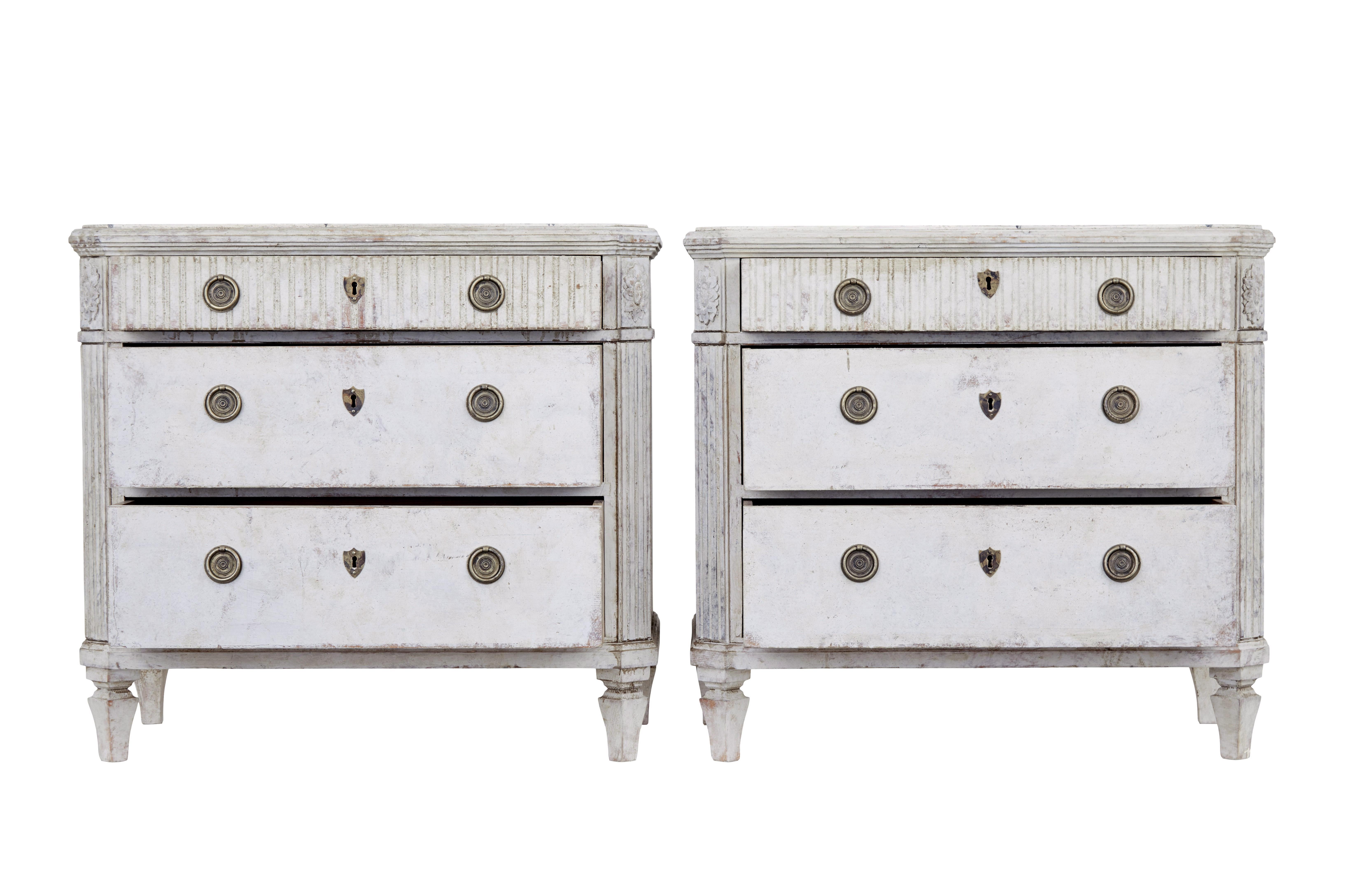 Pair of 19th century painted chest of drawers circa 1880.

Good quality pair of gustavian influenced pair of commodes.  Shaped top surfaces with faux marble hand painted detailing.   Each chest is fitted with 3 drawers and later brass ring handles