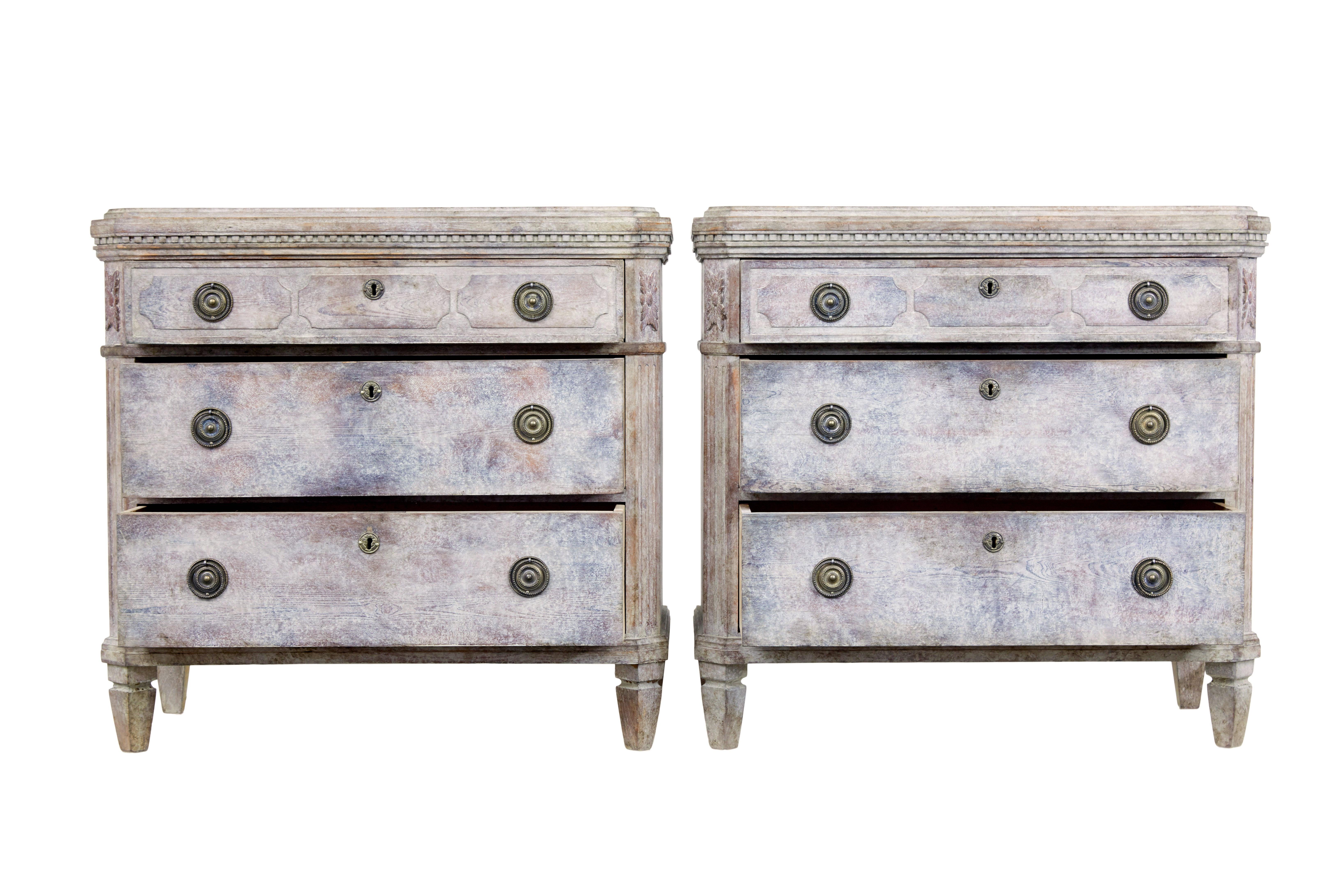 Pair of 19th century painted pine Swedish commodes circa 1880.

Here we have 2 decorative chest of drawers from Sweden painted in the gustavian taste.

Stepped rectangular top's and canted corners, with dentil moulding around the outside.  Each