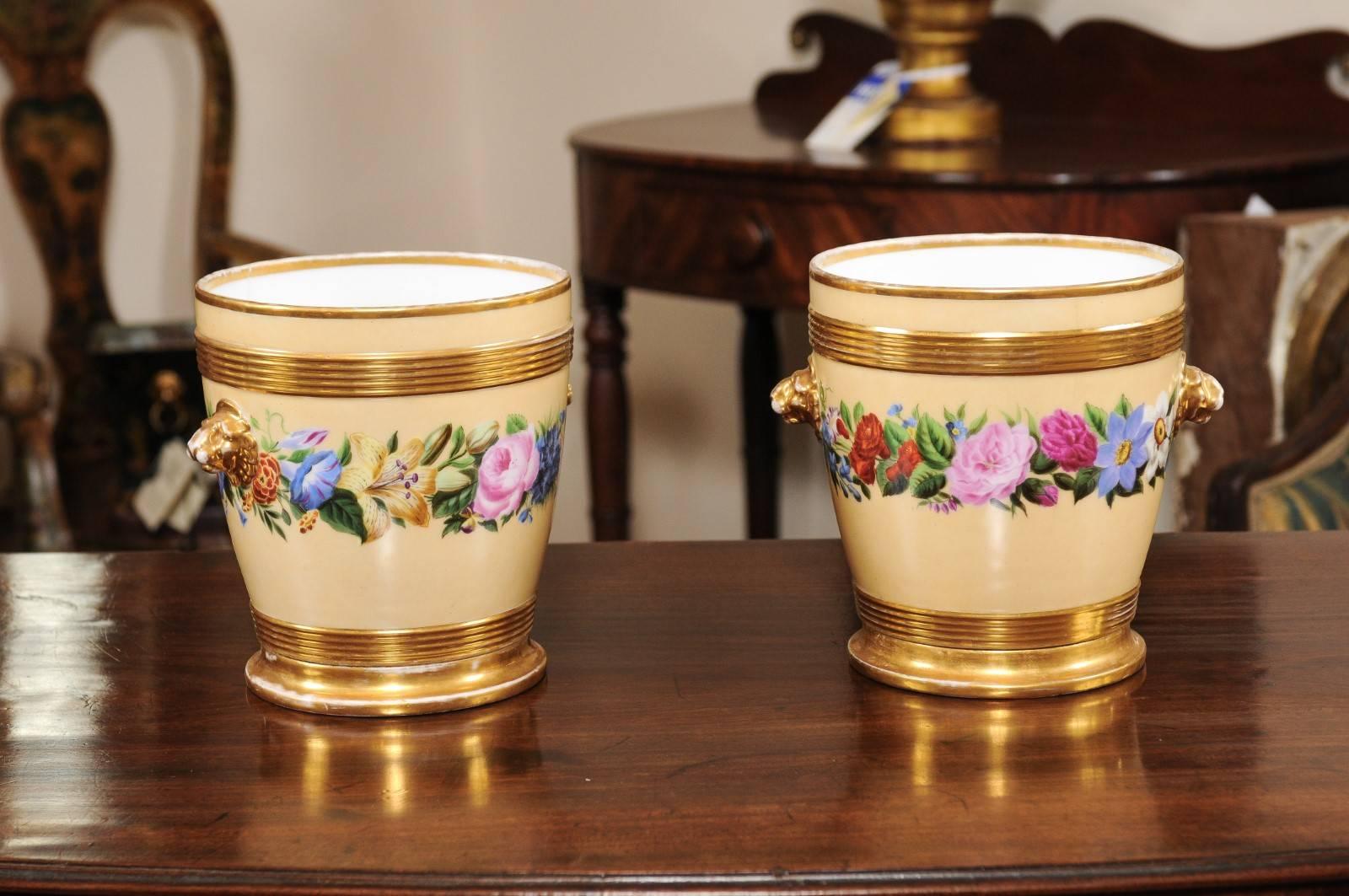 Pair of 19th century Paris Porcelain cachepots with yellow ground & floral decoration.