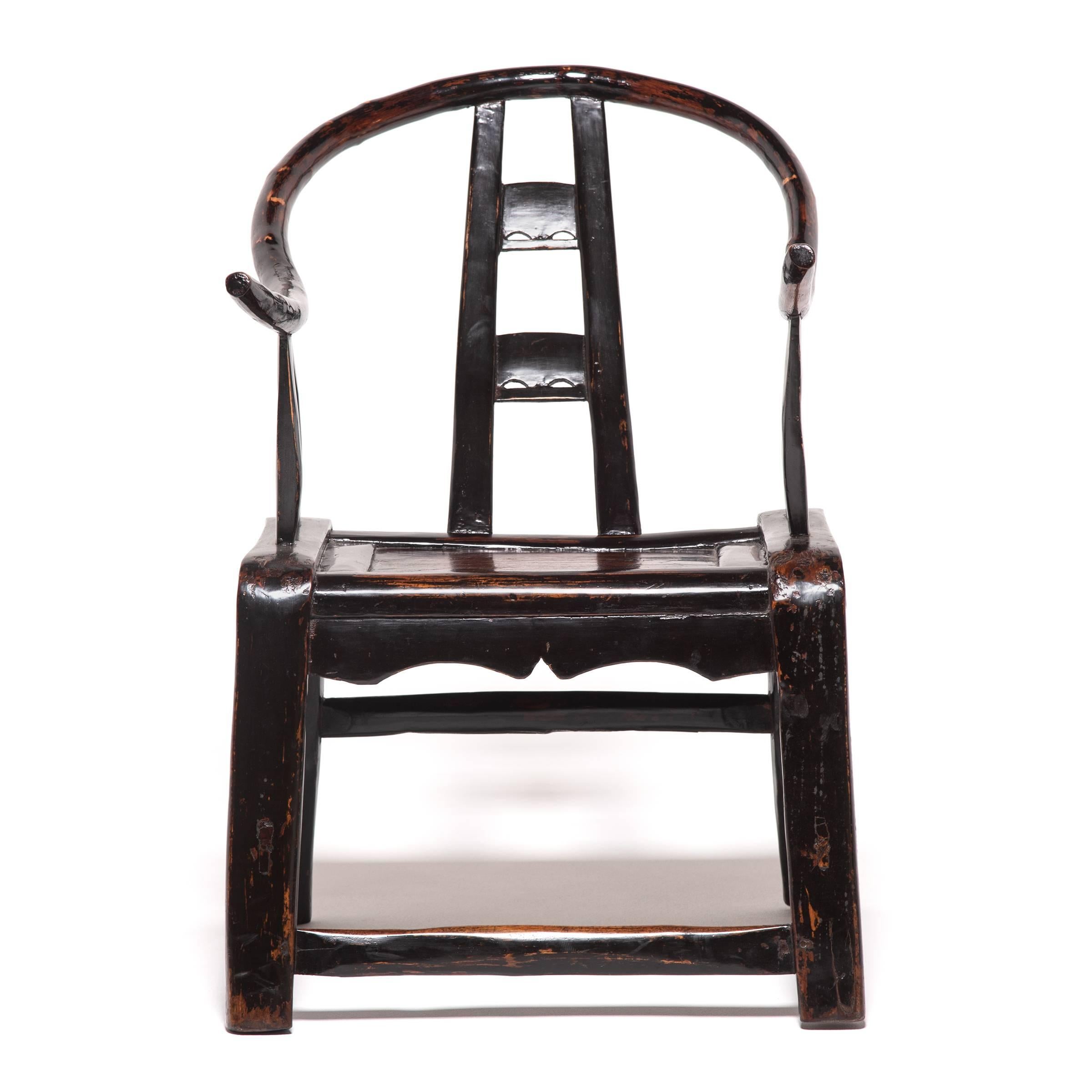 This pair of elmwood chairs was made over a 150 years ago in China’s Shanxi province. Touched by the personal aesthetic sense of the artisan who crafted them, the chairs' simple, elegant form nonetheless hearkens back to classical Chinese furniture