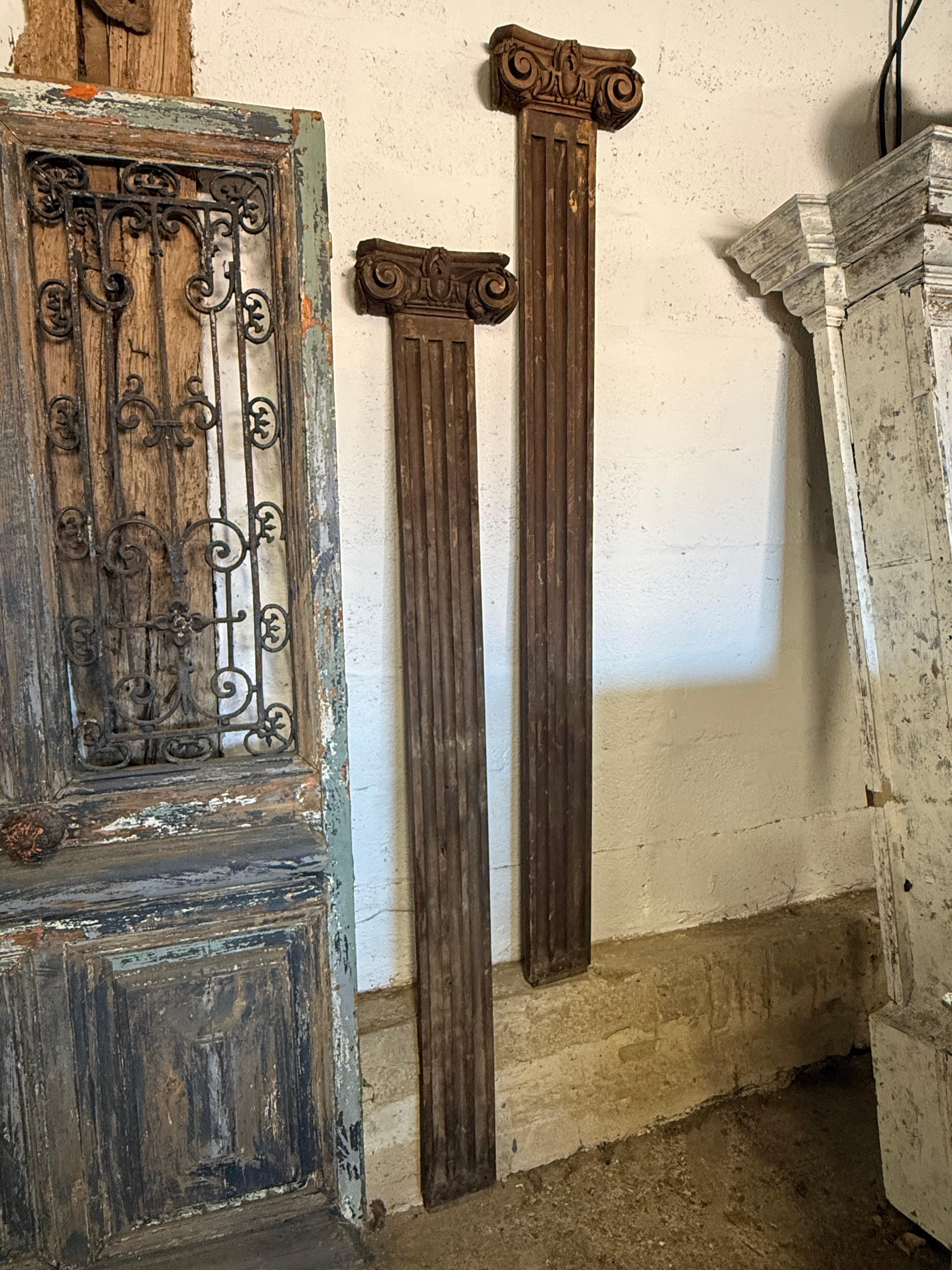 Matching pair of original late 19th century Interior fluted oak Pilasters. With iconic Greek Capitals.

Please contact us for a worldwide shipping quote 