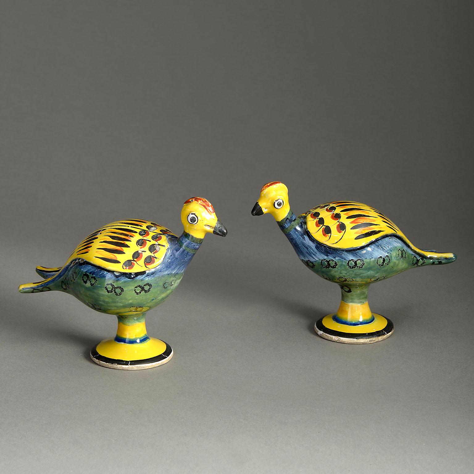 Rare pair of late 19th century polychrome glazed pottery birds.
