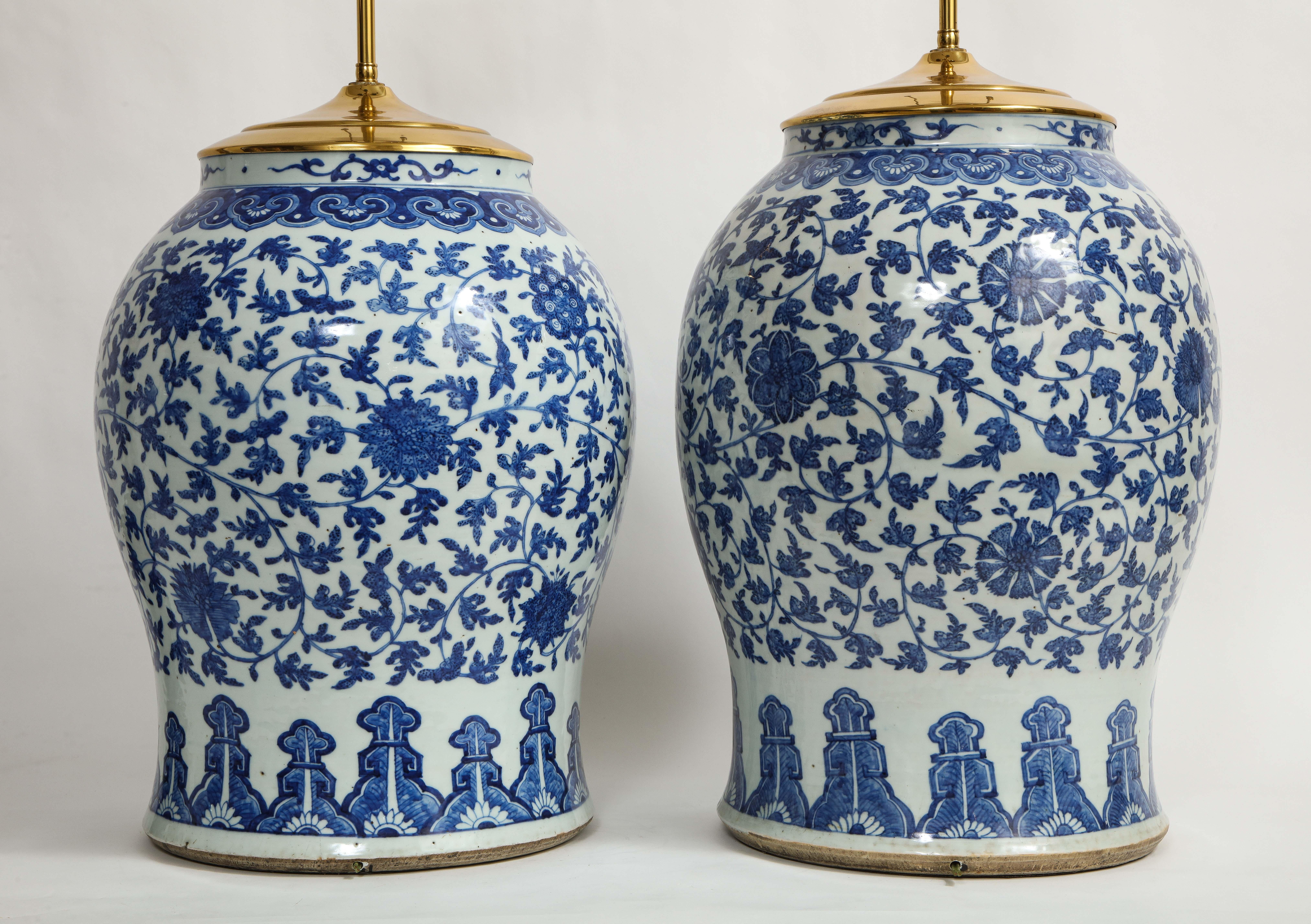 Hand-Painted Pair of 19th Century Qing Dynasty Chinese Blue and White Vases Turned to Lamps For Sale