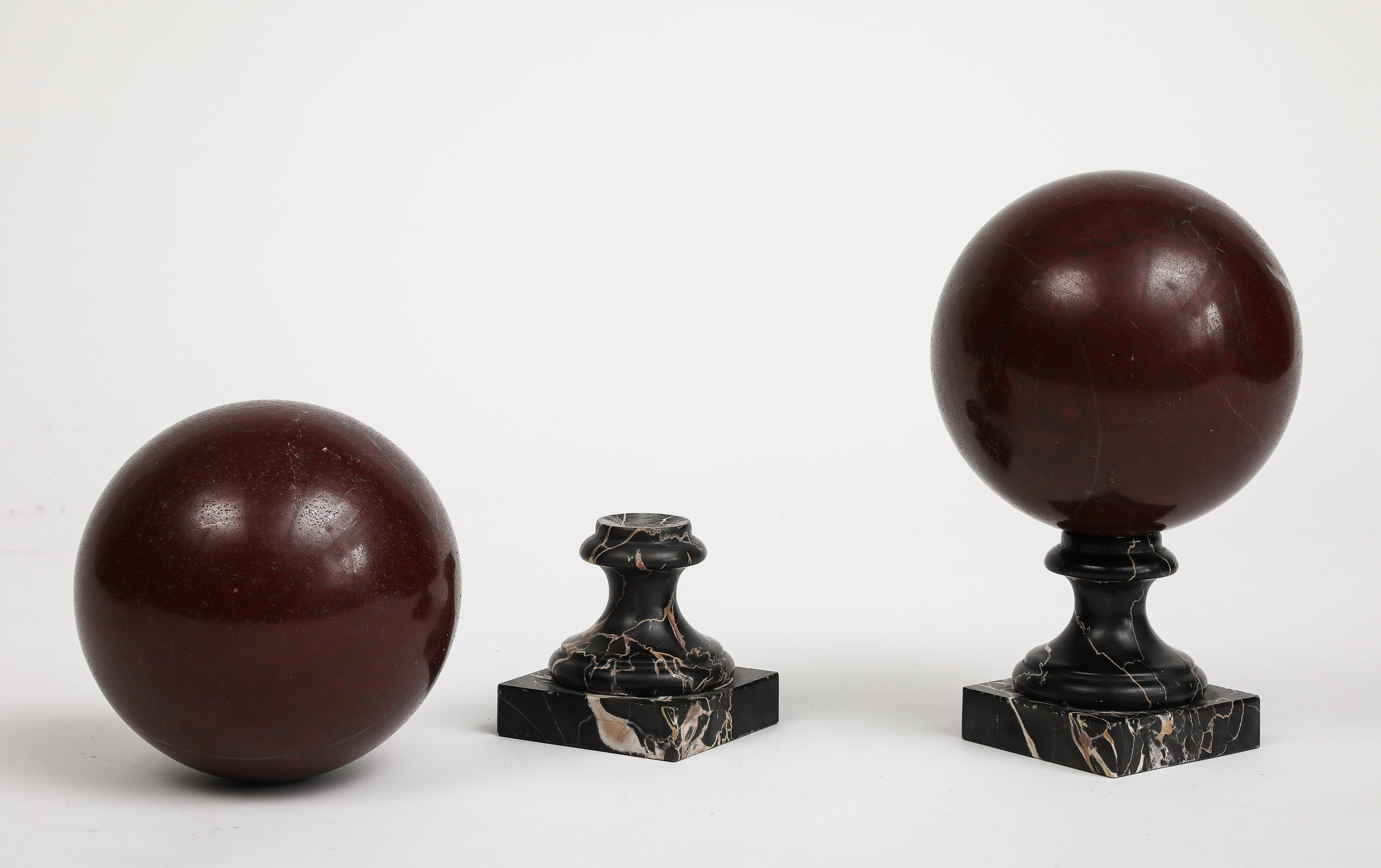 Pair of 19th Century Red Marble Spheres on Black Marble Stands For Sale 8