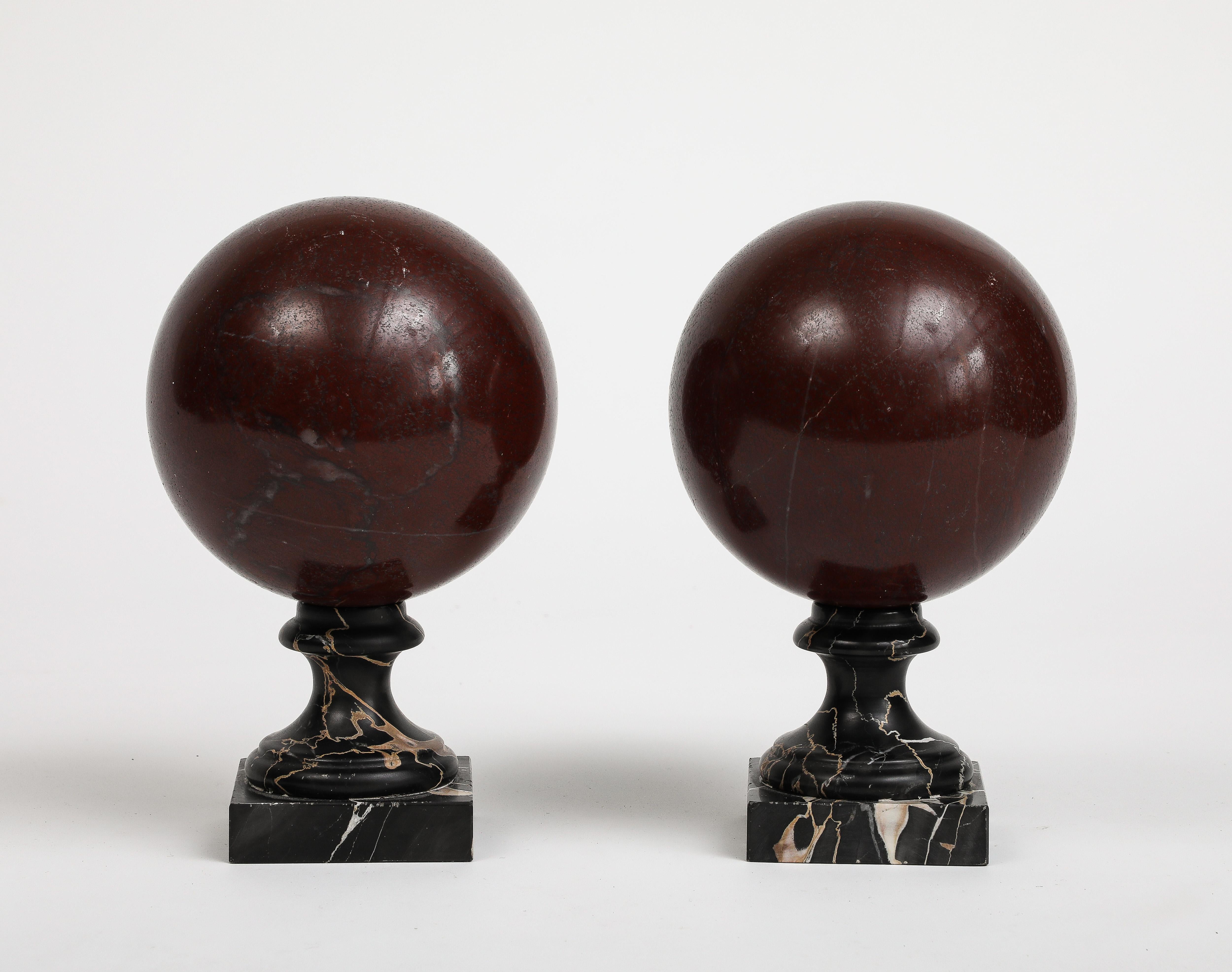 Pair of 19th Century Red Marble Spheres on Black Marble Stands For Sale 2