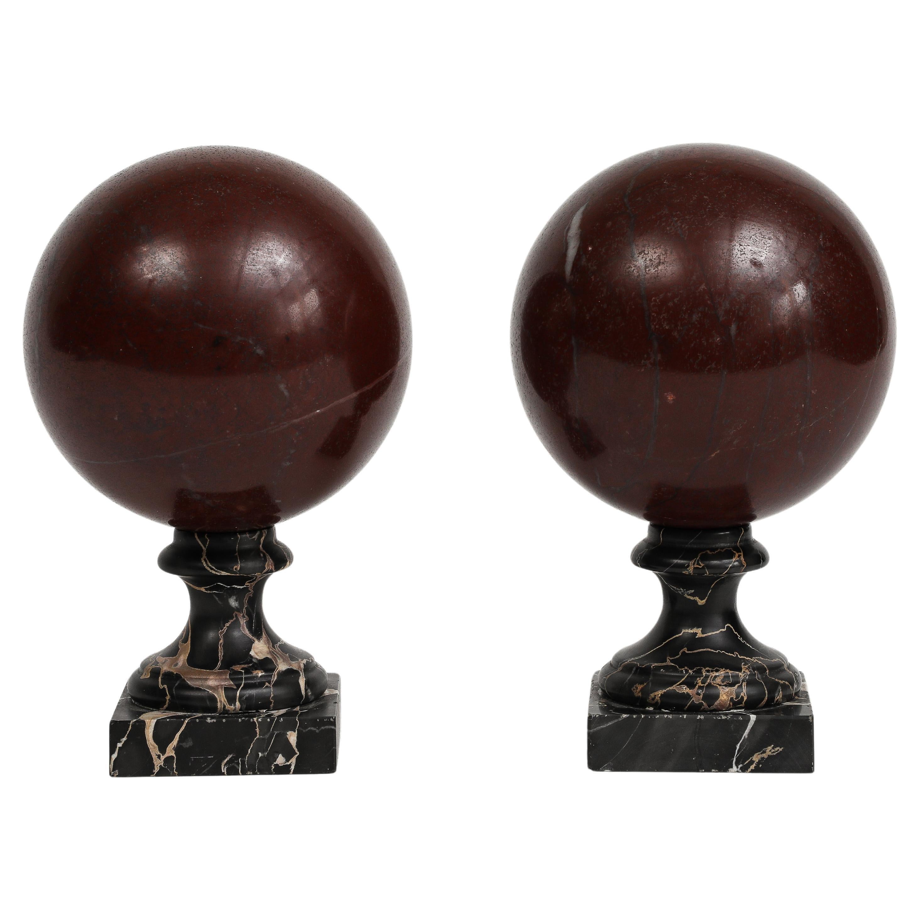 Pair of 19th Century Red Marble Spheres on Black Marble Stands For Sale
