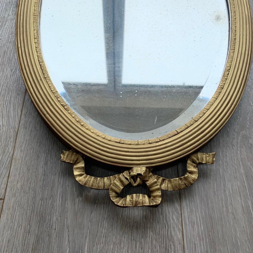 English Pair of 19th Century Regency Oval Gilt Mirrors with Bevelled Mirror Glass