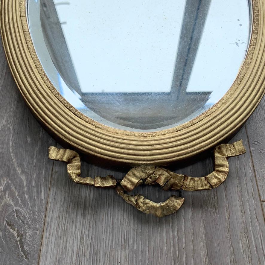 Early 19th Century Pair of 19th Century Regency Oval Gilt Mirrors with Bevelled Mirror Glass