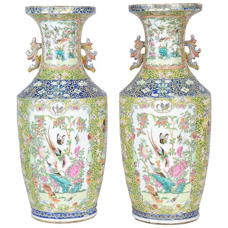 A beautiful pair of 19th century Chinese rose medallion / Cantonese vases, each with wonderful classical motif decorations in yellows, blue backgrounds. Inset hand painted panels of exotic birds, flowers and butterflies.
We can have the vases