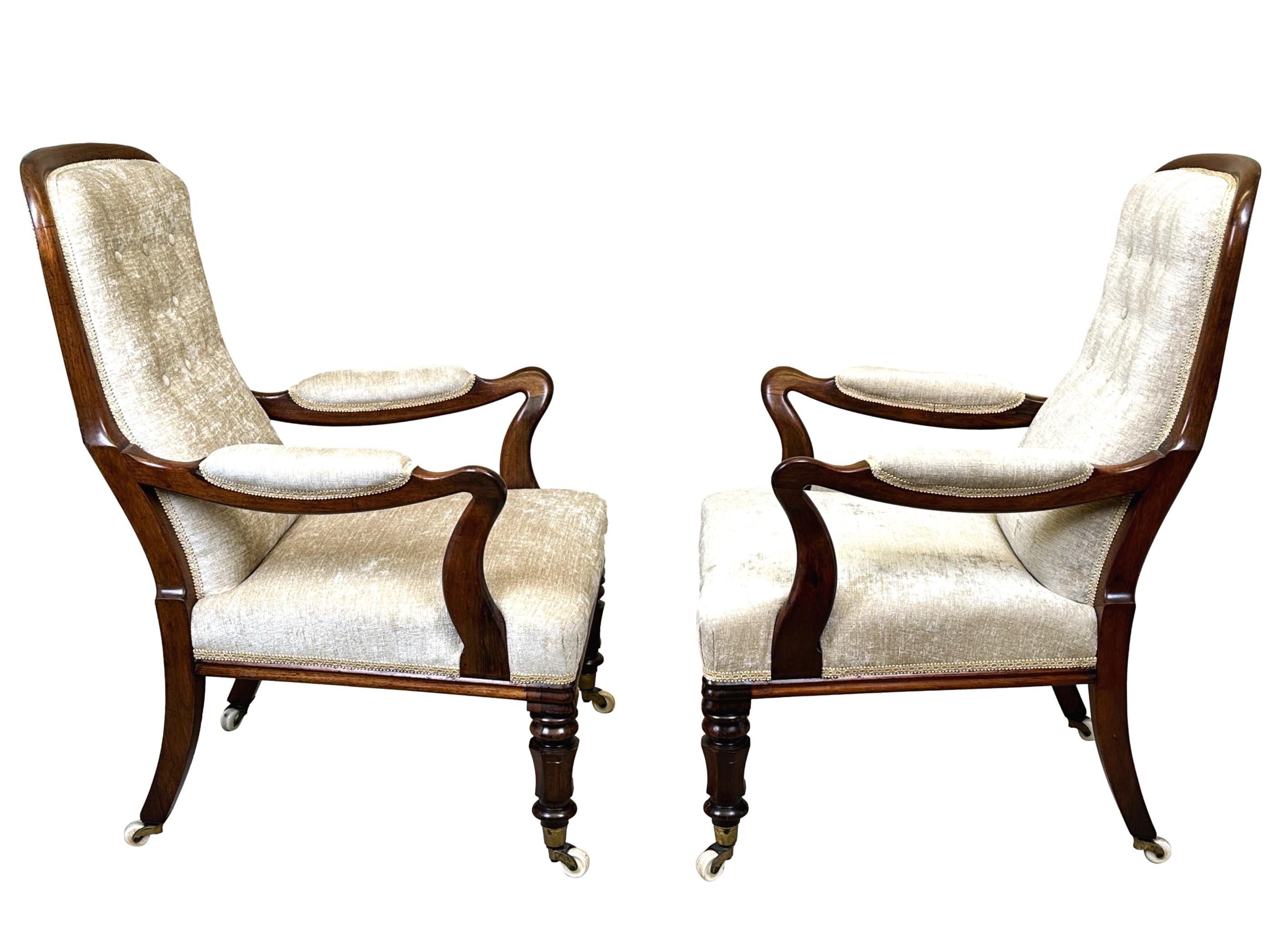 An Exceptional Quality Pair Of Mid 19th Century, Victorian Period,  Rosewood Library Armchairs Of Extremely Good Proportions, Having Attractive Sheperds Crook Shaped Arms Over Generous Seats, Raised On Elegant Turned And Faceted Legs With Original