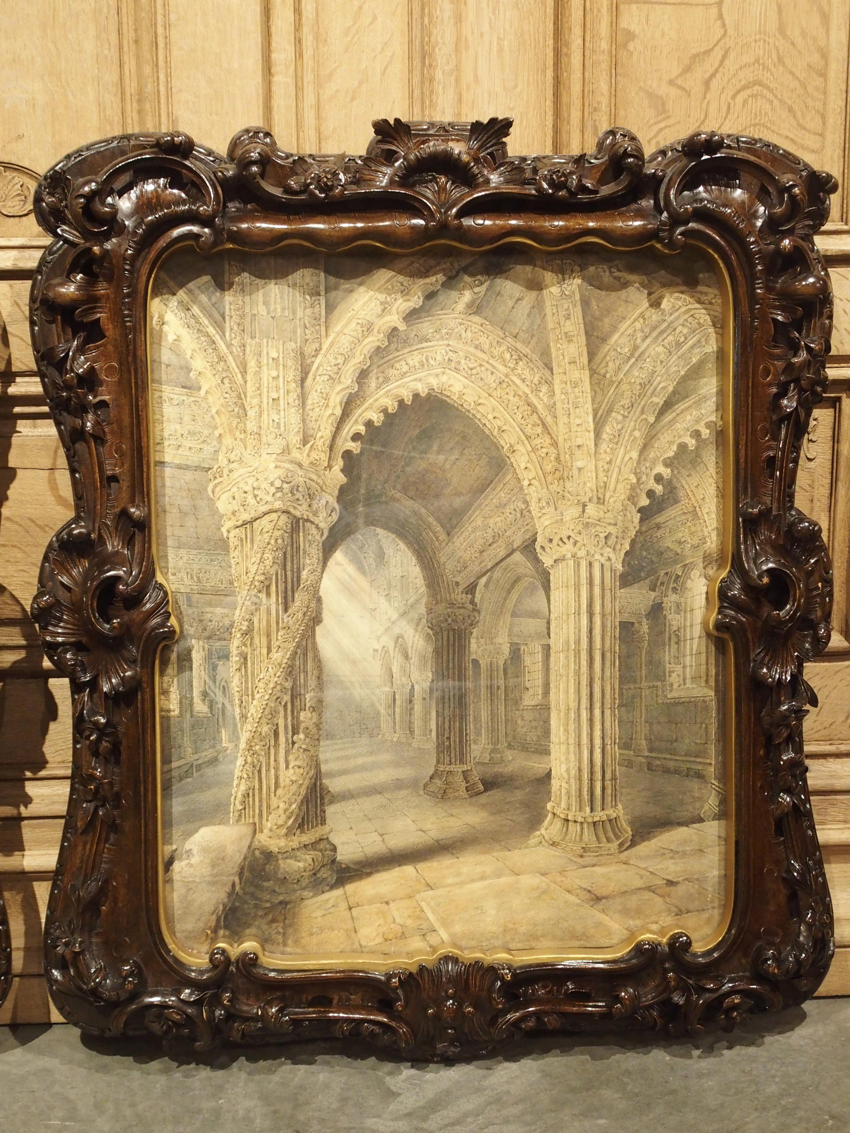 This impressive pair of large watercolor paintings are surrounded by elaborate hand carved fruitwood frames which depict the interior of the famed Rosslyn Chapel.

The Rosslyn Chapel is a 15th century chapel located in Roslin, Scotland, just