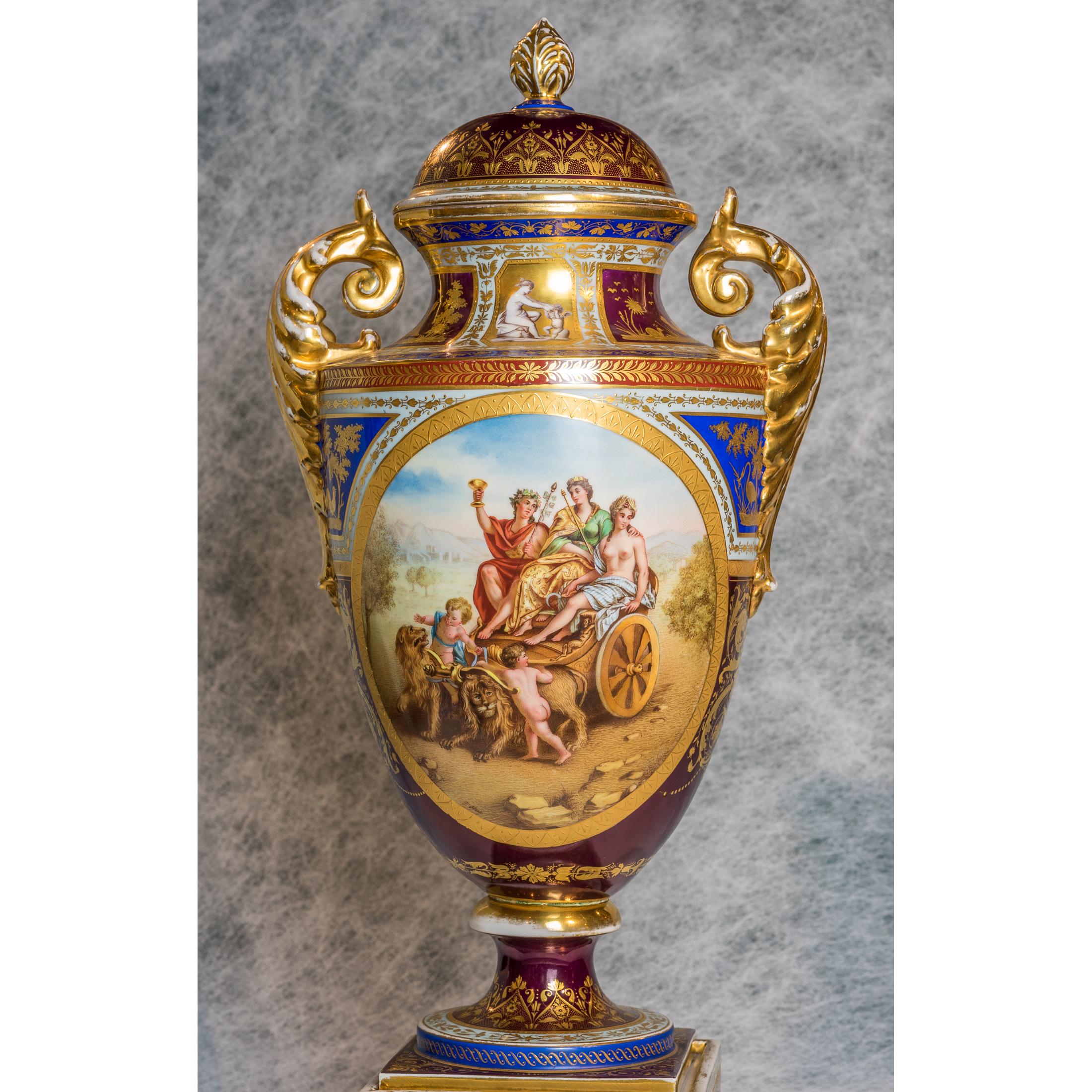 A fine pair of royal Vienna porcelain vases and covers with mythological scenes. With blue ground, gilded and decorated with mythological scenes, Austria, late 19th century.

Origin: Austria
Date: Late 19th century
Dimension: 21 in. x 8 1/2 in.