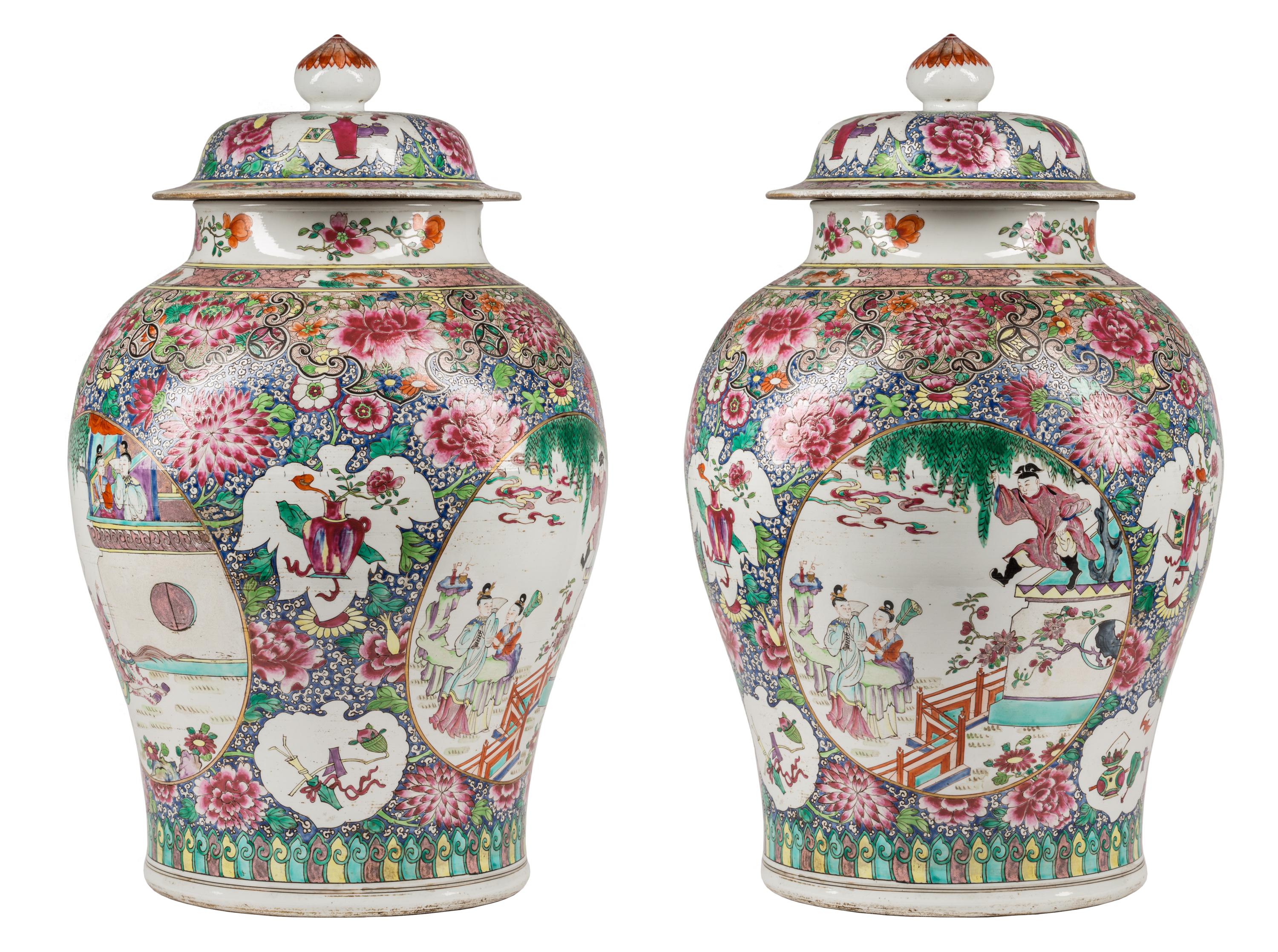 A matched pair of 19th century porcelain urns with lids, made by Samson Edmé et Cie porcelain, of Paris. Samson opened in 1845 and soon became well-known for making reproductions of ceramic pieces on display in museums and private collections.