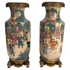 Pair Of 19th Century Satsuma Vases Made Of Porcelain With Bronze Bases.