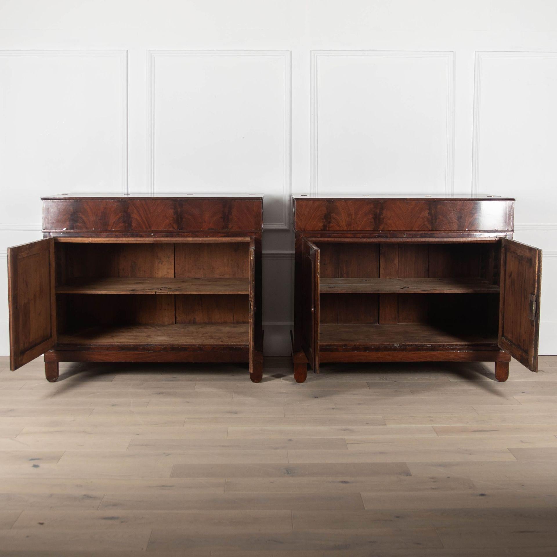 Pair of very unusual serving cupboards made in 1837.

With the original label inside with the delivery address. Made out of mahogany with flame mahogany doors.