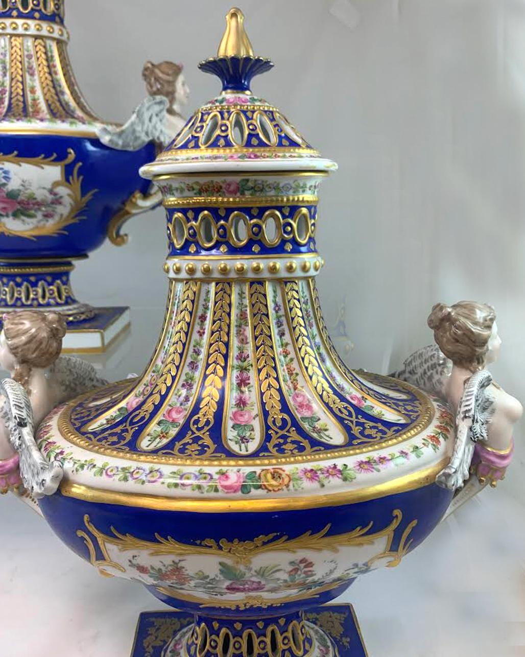Hand-Painted Pair of 19th Century Sèvres Hand Painted Reticulated Covered Urns