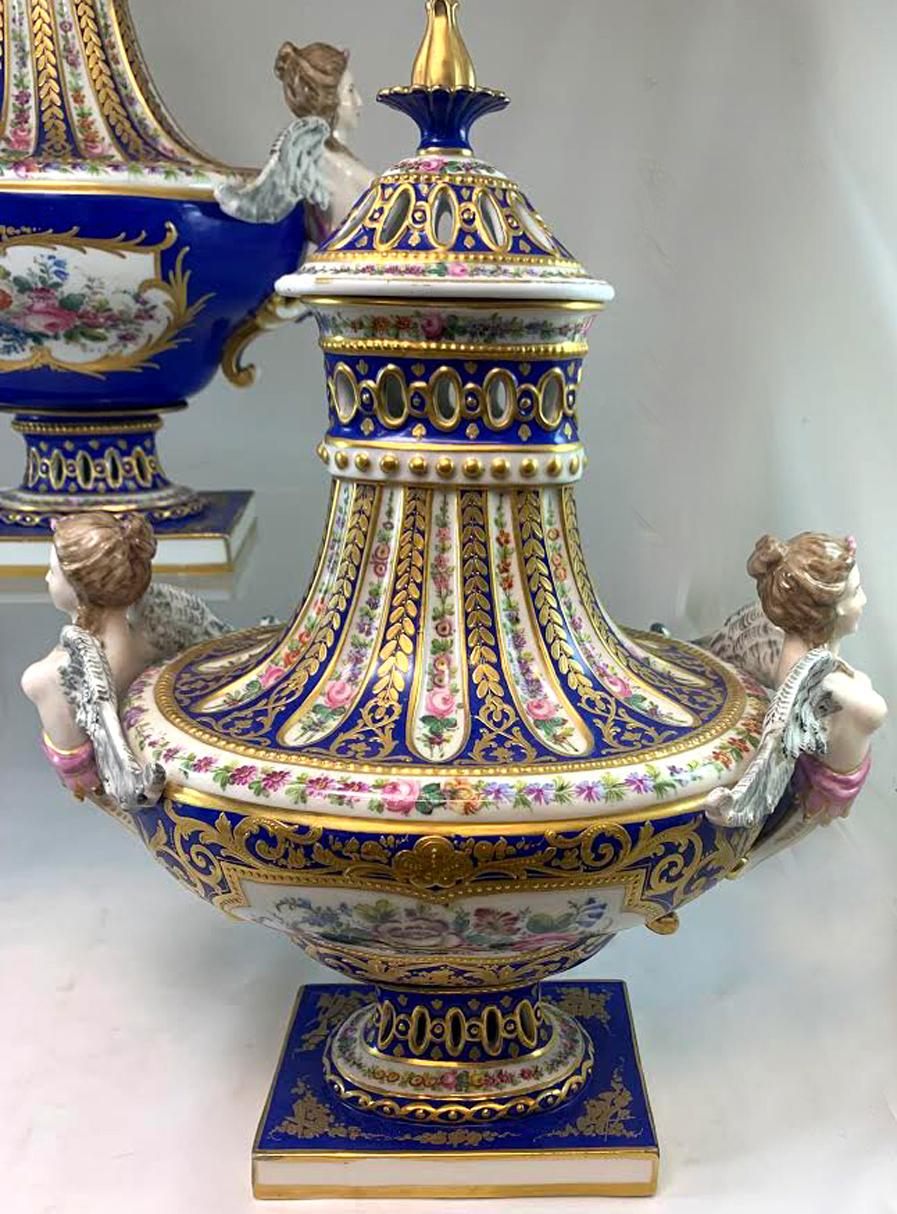 Porcelain Pair of 19th Century Sèvres Hand Painted Reticulated Covered Urns