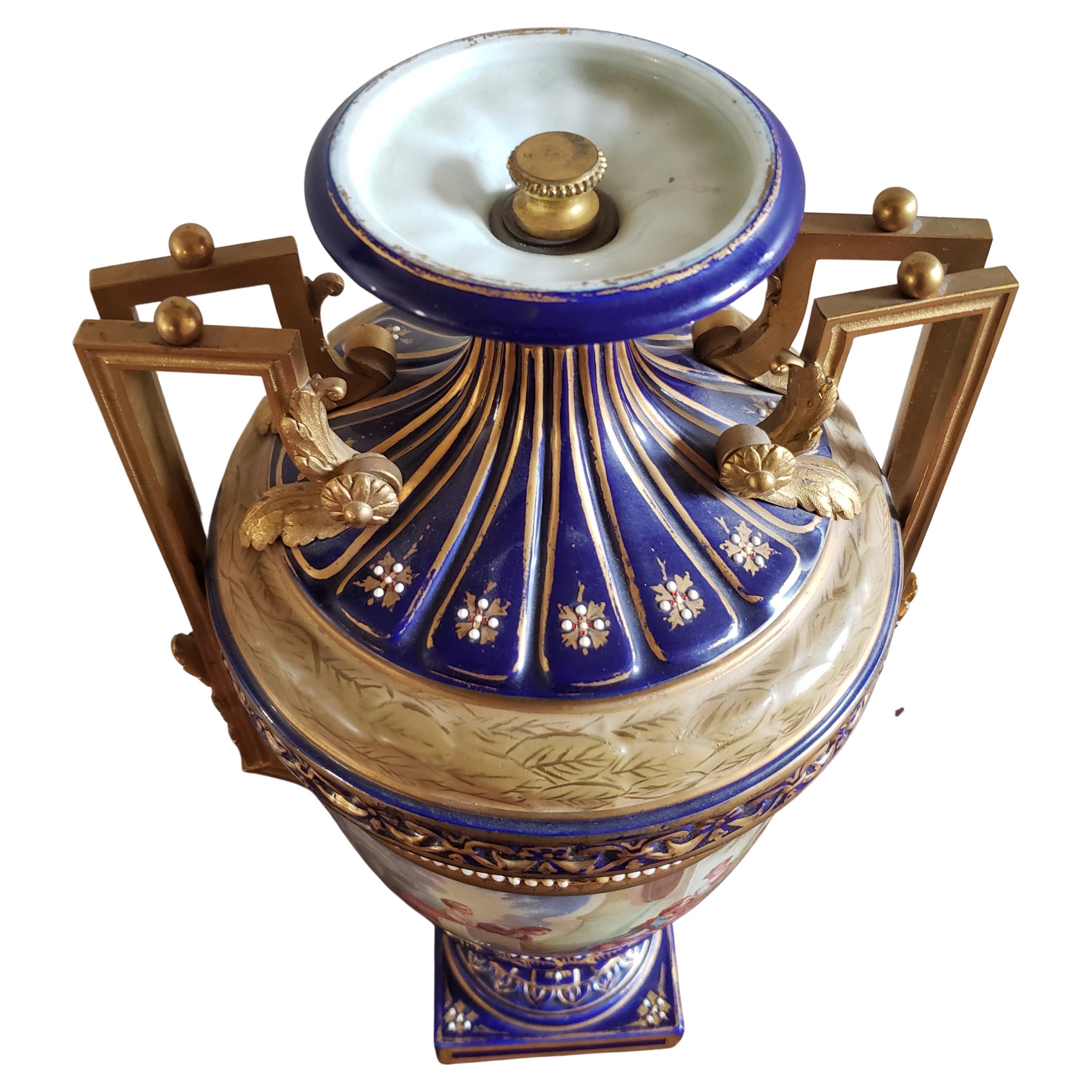 French Pair of 19th Century Sevres Porcelain Hand Painted Cobalt & Gilt Decorated Urns For Sale