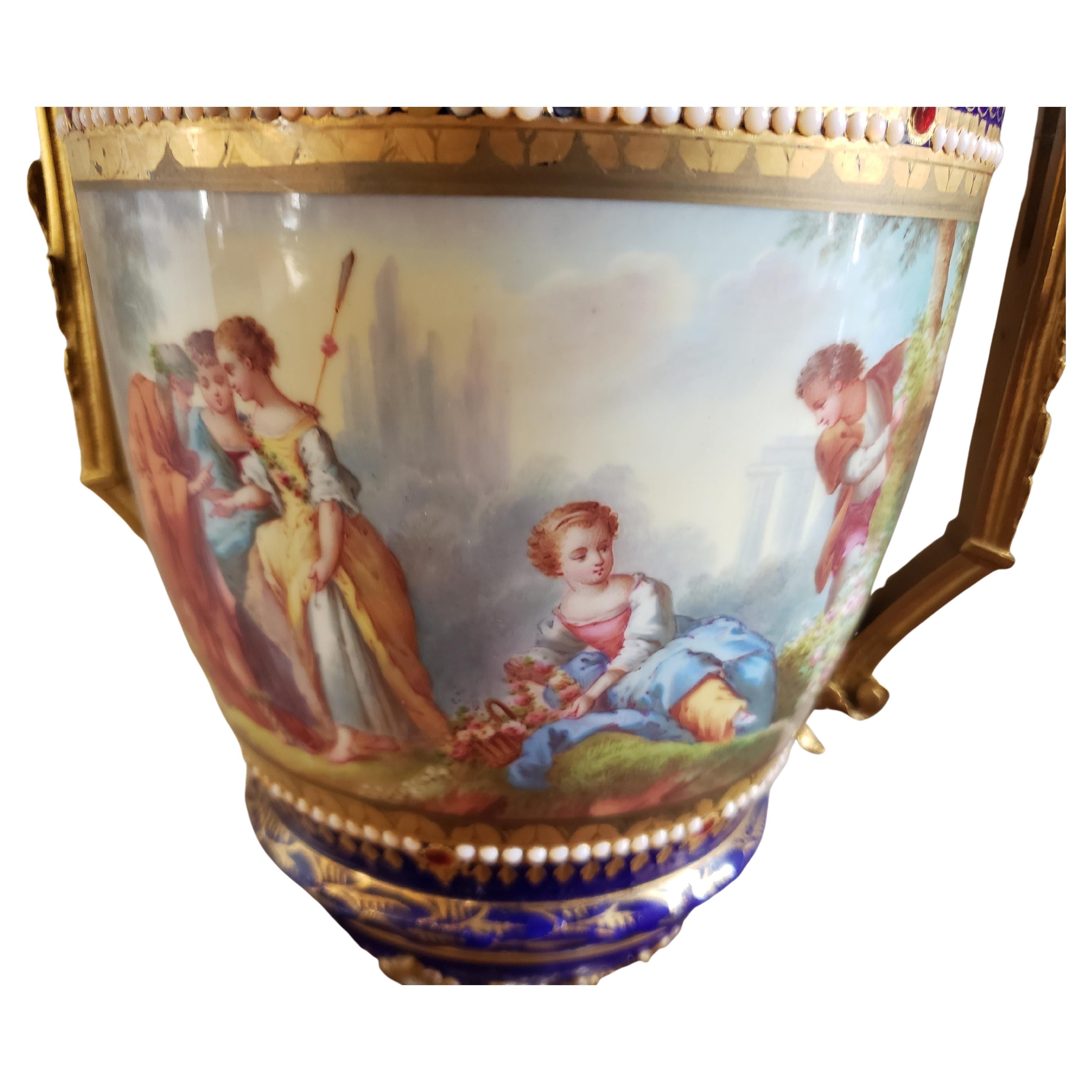 Hand-Painted Pair of 19th Century Sevres Porcelain Hand Painted Cobalt & Gilt Decorated Urns For Sale