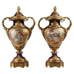 Pair of 19th Century Sèvres Style Cobalt Blue Painted Porcelain Urns