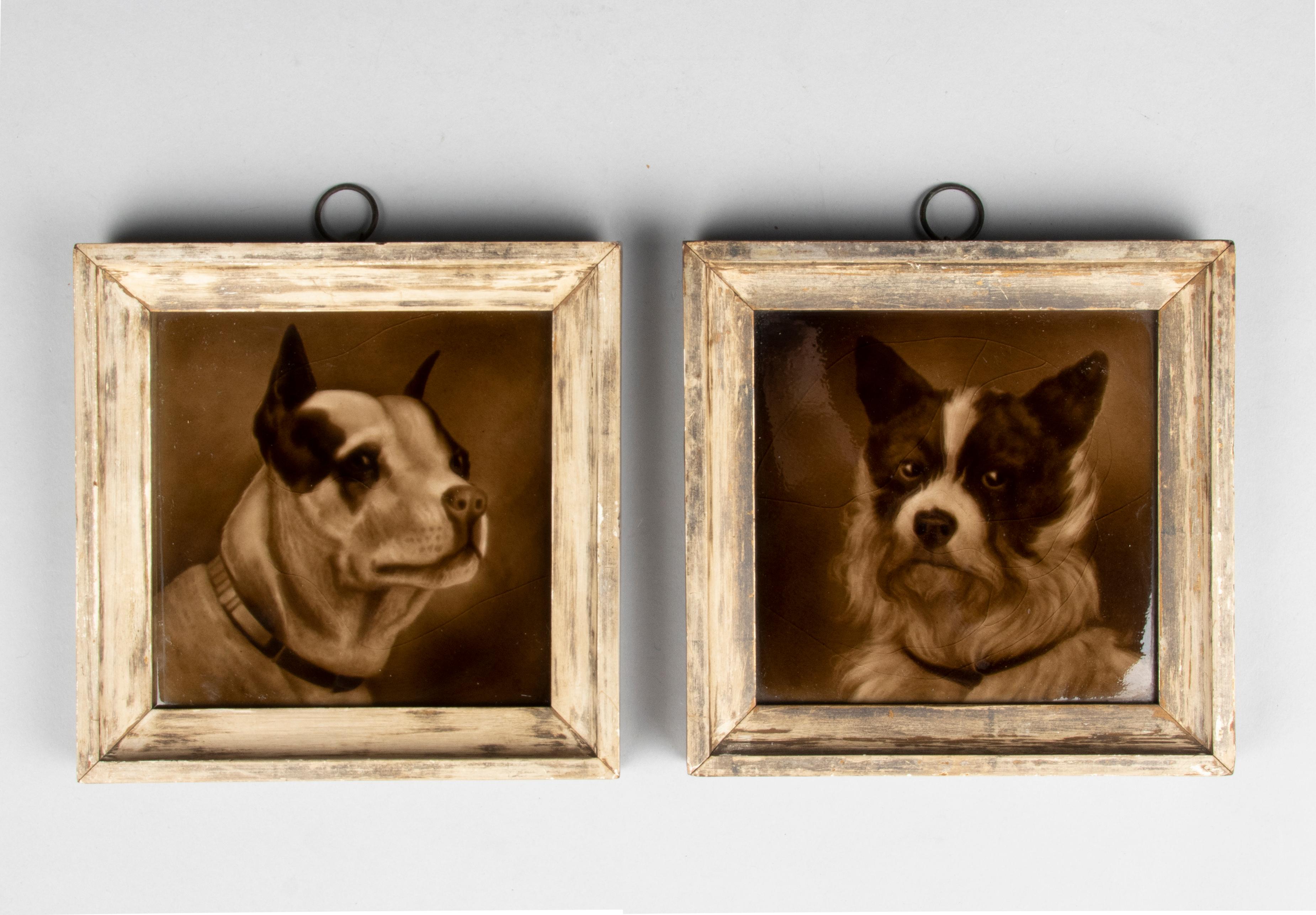 A beautiful pair of semi relief tiles in caramel tones featuring two dogs looking directly at the viewer. The tiles date from circa 1860, various relief marks to the back including 