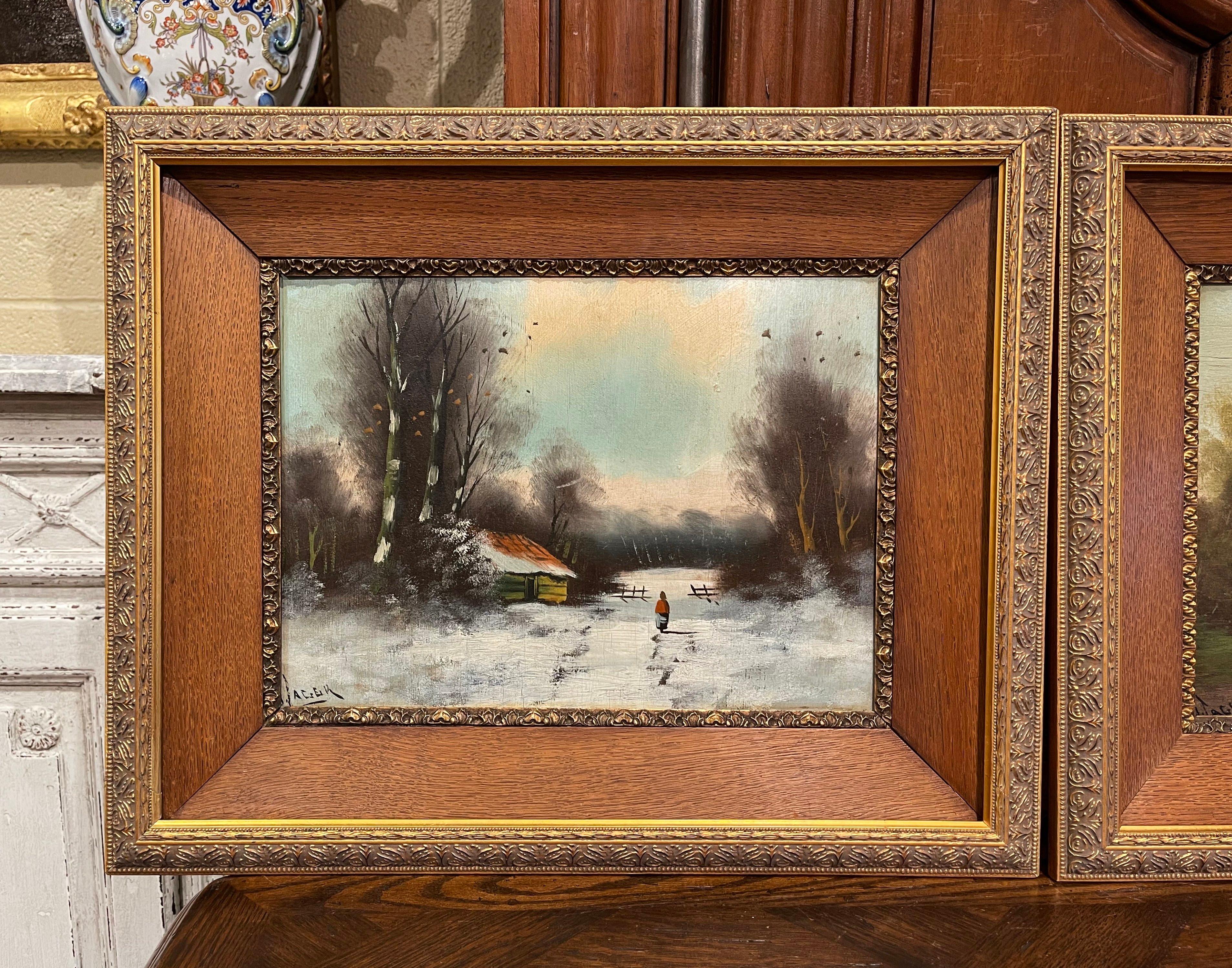 Decorate a kitchen wall or an office with this elegant pair of antique paintings; crafted in England, circa 1880, each artwork is set in the original carved oak and gilt frame; each painting depicts a pastoral countryside scene in the fall and