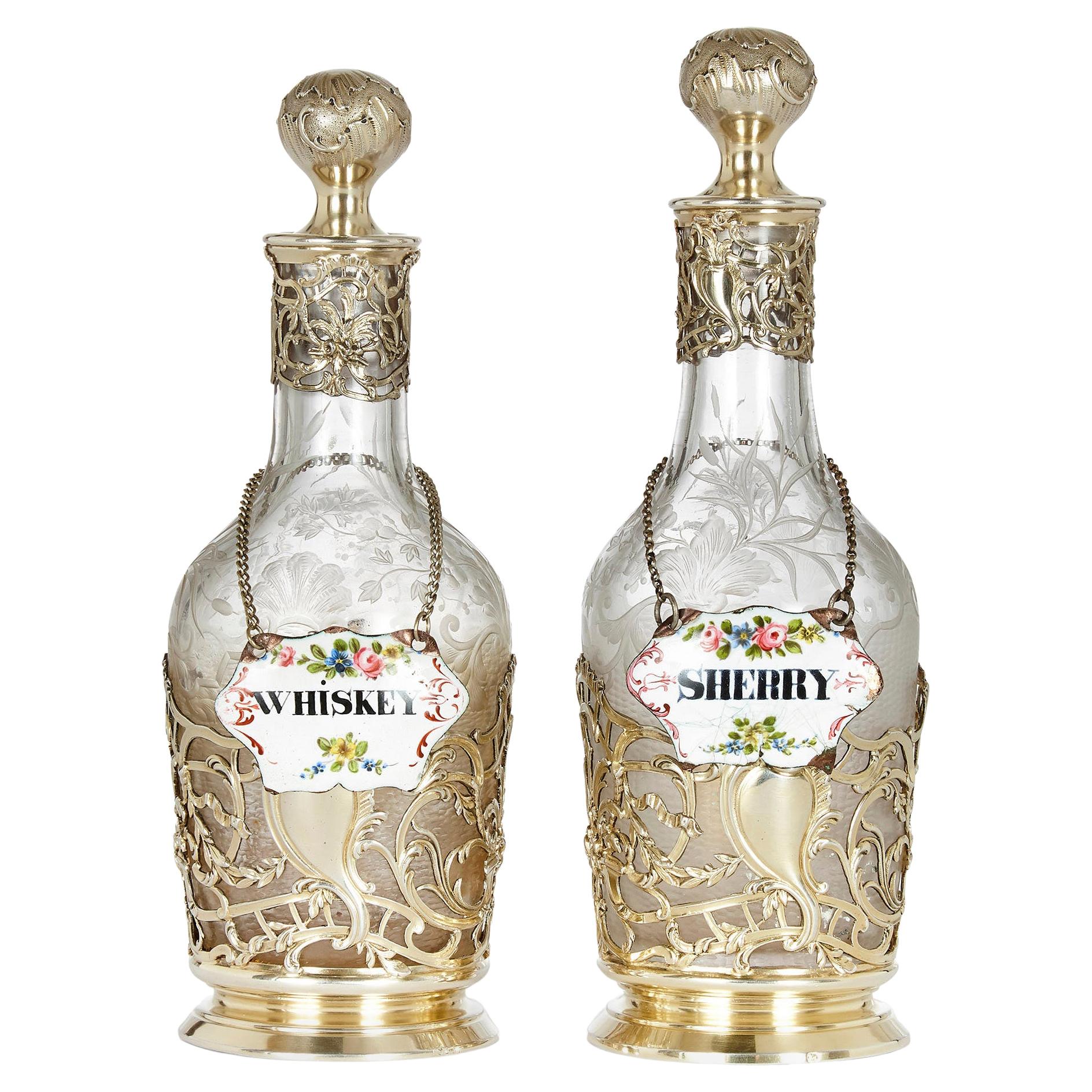 Pair of 19th Century Silver and Crystal Decanters For Sale