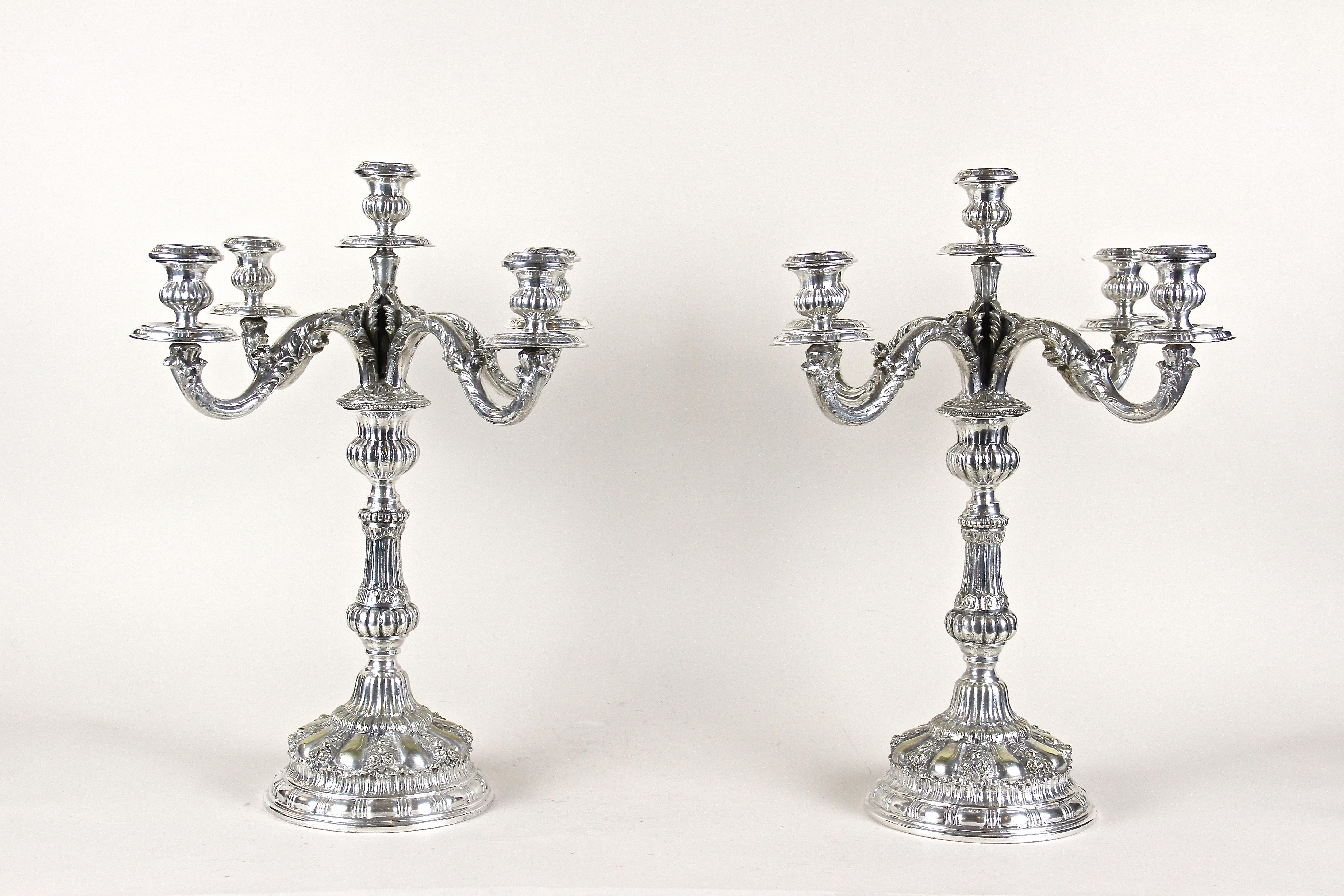 Magnificent pair of mid-19th century silvered candelabras coming out of Austria from the period around 1860. Absolute artfully designed with incredible small details, these large exceptional vienesse candelabras were elaborately hand chased out of
