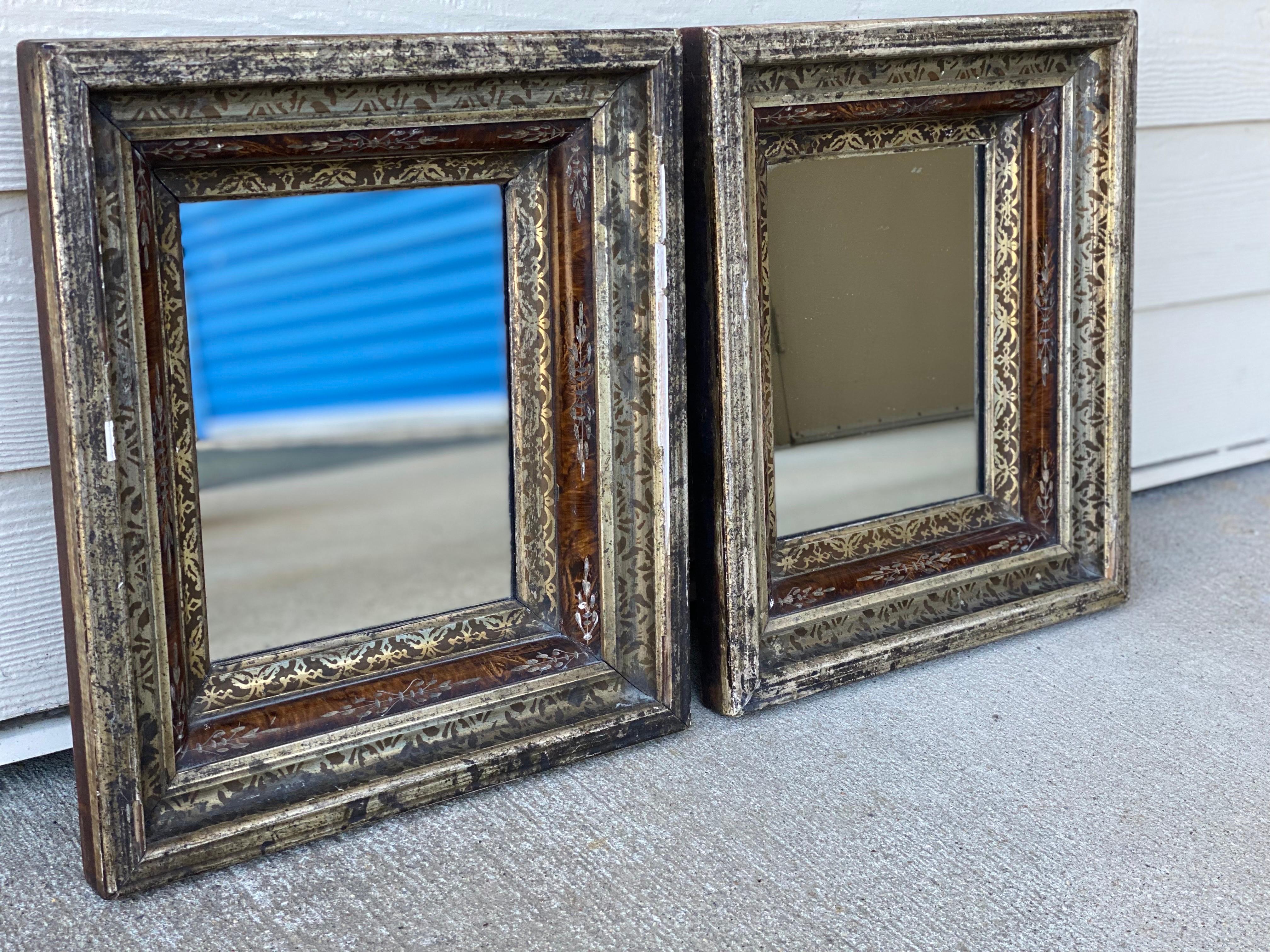 Pair of late 19th century small silver-gilt & faux tortoise shell patterned mirrors
A handsome pair of silver gilt mirrors, inset tortoise with incised design with a painted patterned design overlaying the entire frame. Some minor losses to the