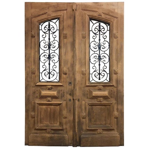 Pair Of 19th Century Solid Oak Doors With Wrought Iron Inserts At