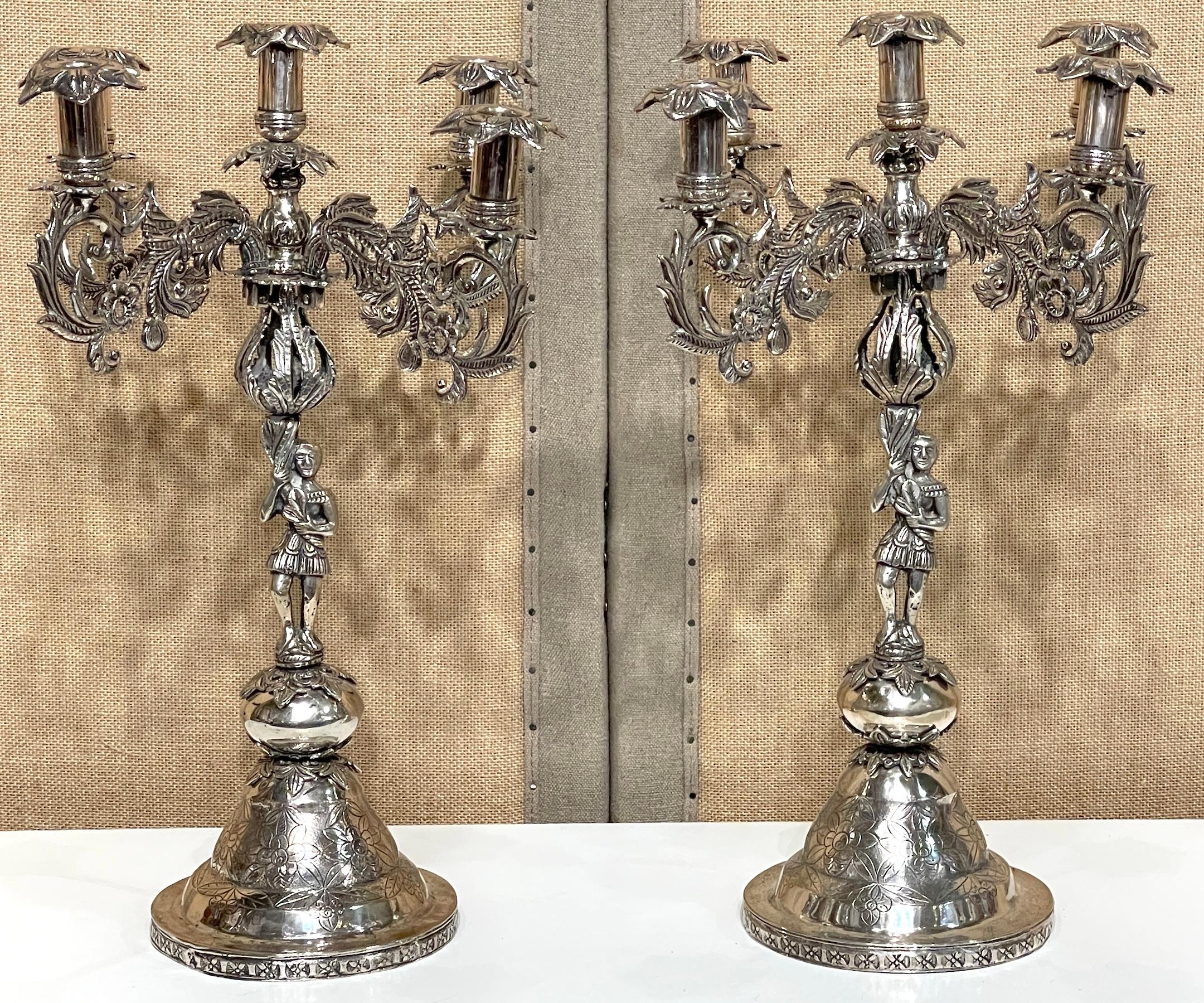 Pair of 19th-century Spanish Colonial Exotic Tobacco Leaf 5-Light Candelabra 
Peru, mid-19th century 

This extraordinary pair of 19th-century Spanish Colonial Exotic Tobacco Leaf 5-Light Candelabras from mid-19th-century Peru is a remarkable find.