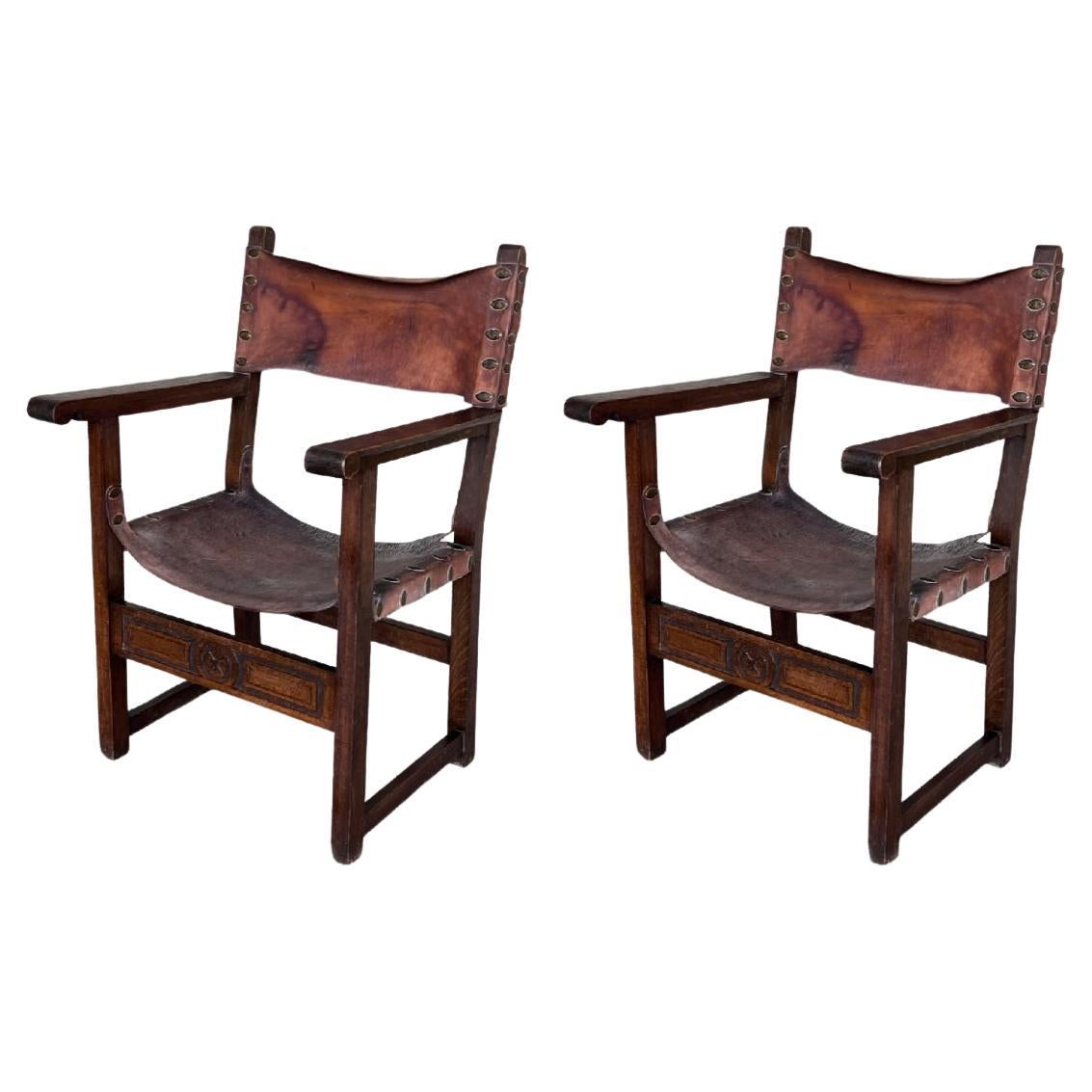 Pair of 19th Century Spanish Colonial Style Carved Armchairs with Leather For Sale