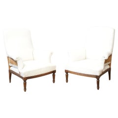 Pair of 19th century square back armchairs with carved frame