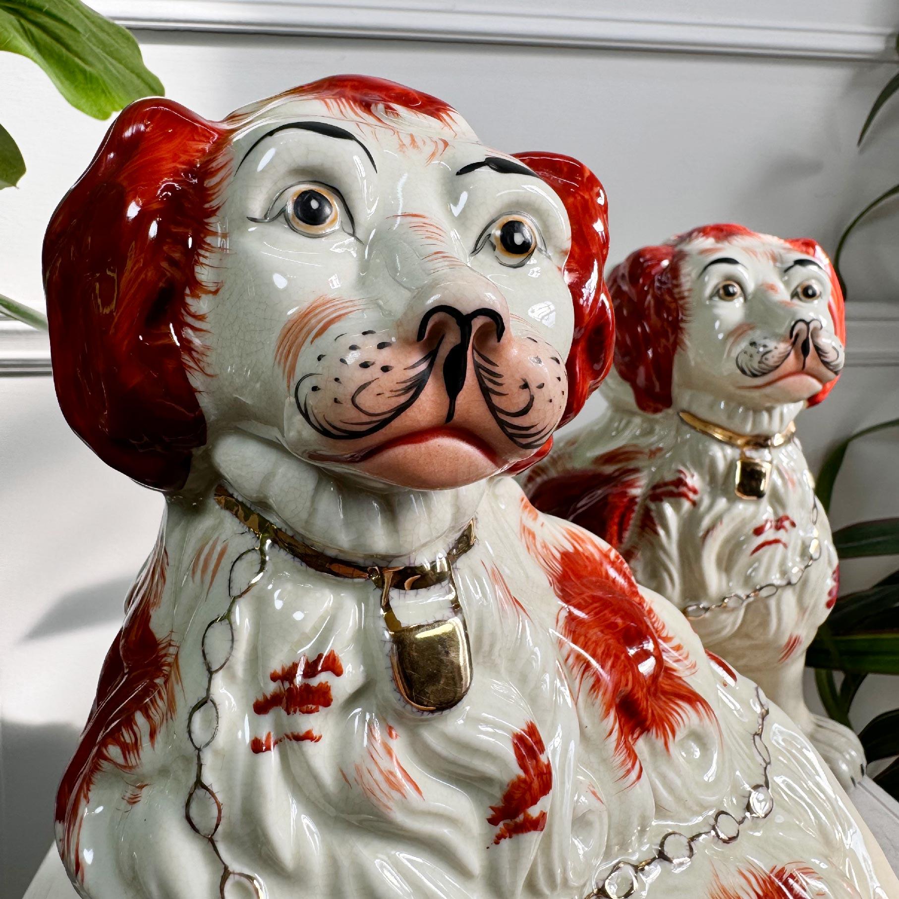 A seated pair of circa 1860 Staffordshire dogs, textured coats and very well painted in Ox blood red, the faces to resemble Kind Charles II moustachioed face
These are of great quality and finely decorated

The original inspiration for the
