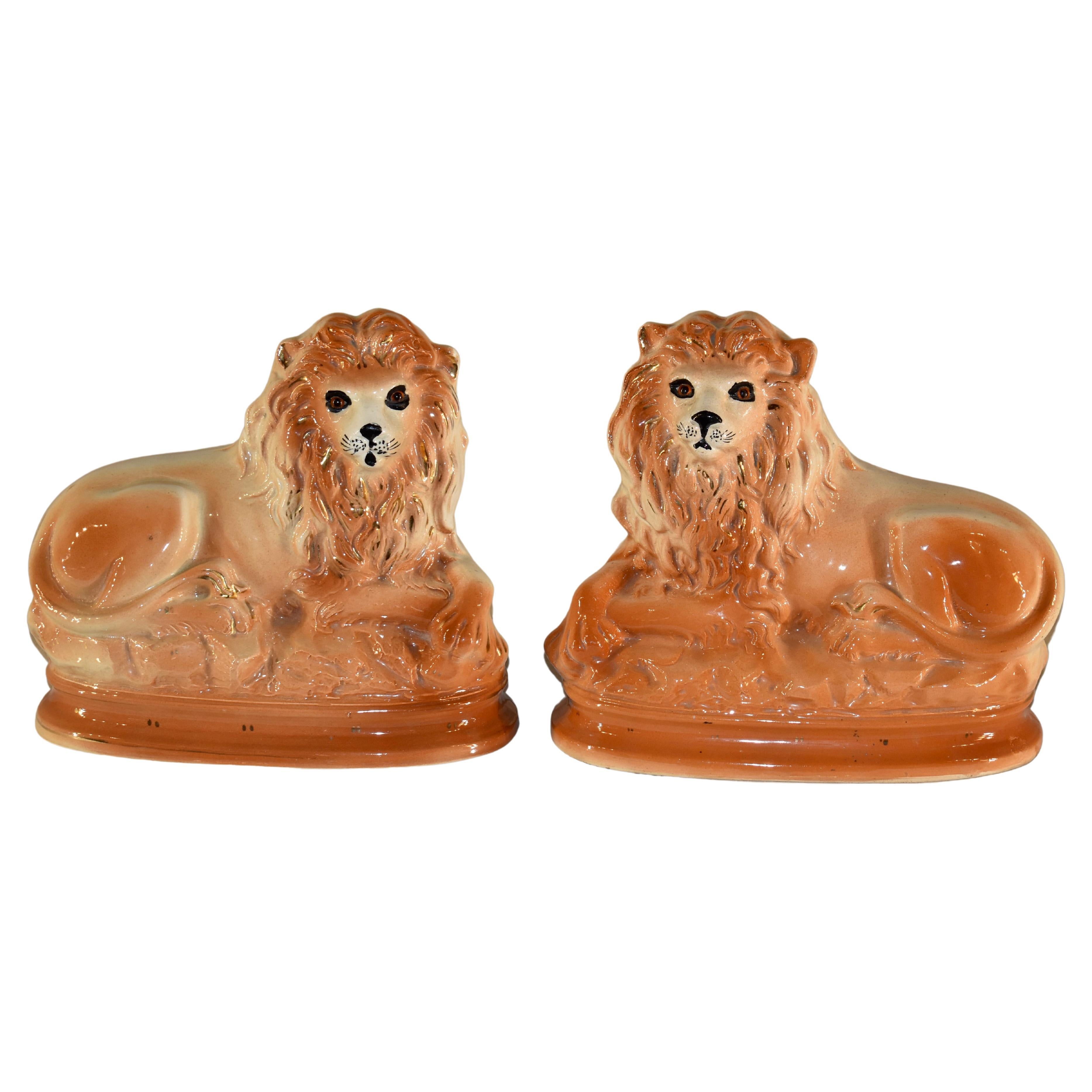 Pair of 19th Century Staffordshire Lions 