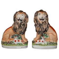 Pair of 19th Century Staffordshire Lions/Lambs
