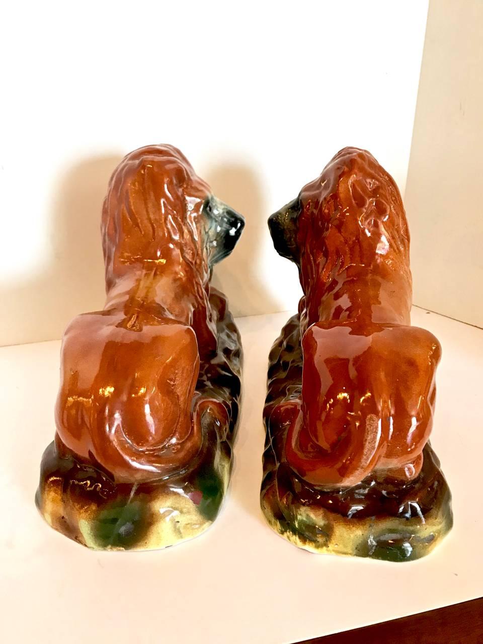 Pottery Pair of 19th Century Staffordshire Recumbent Lions For Sale
