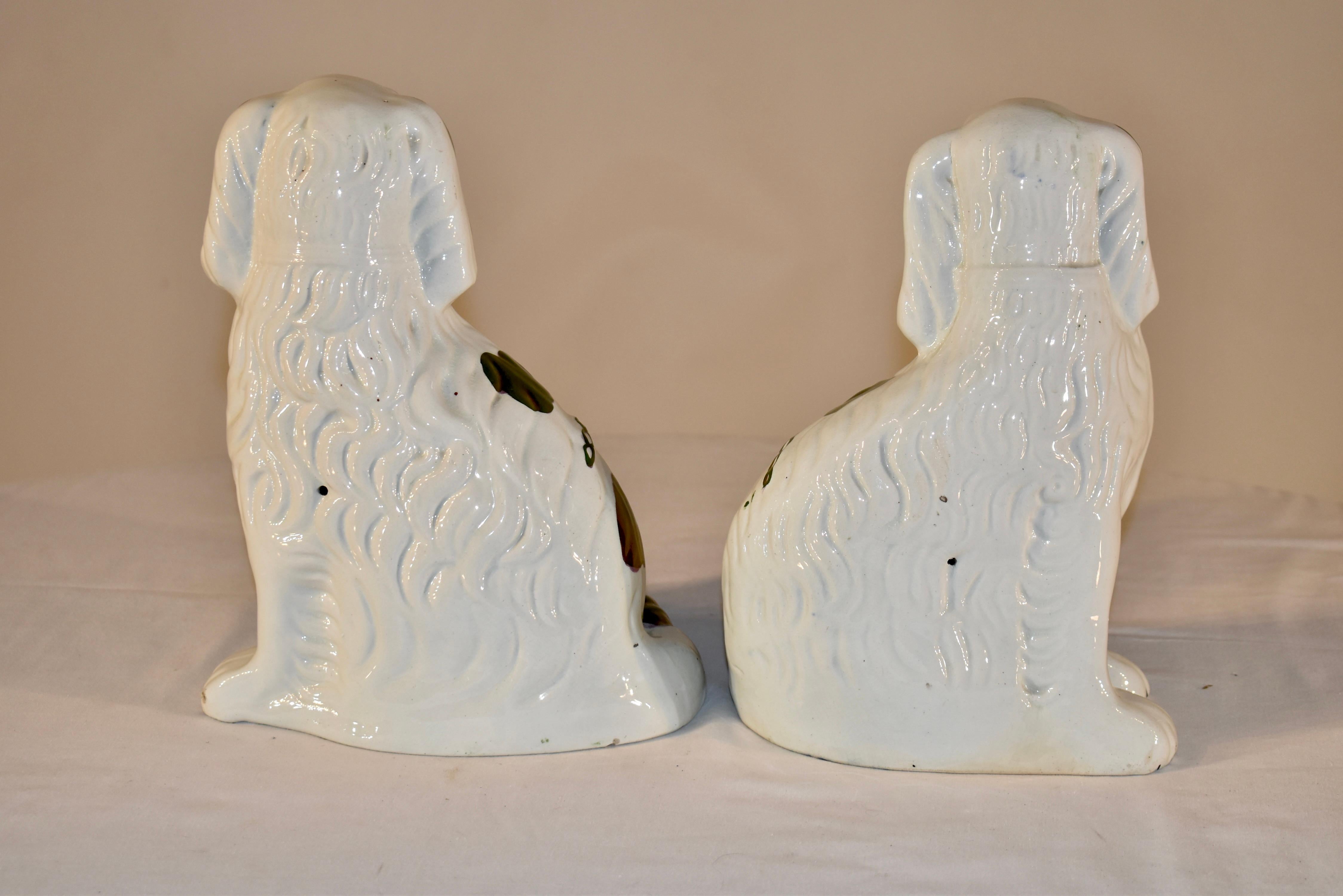 Pottery Pair of 19th Century Staffordshire Spaniels For Sale