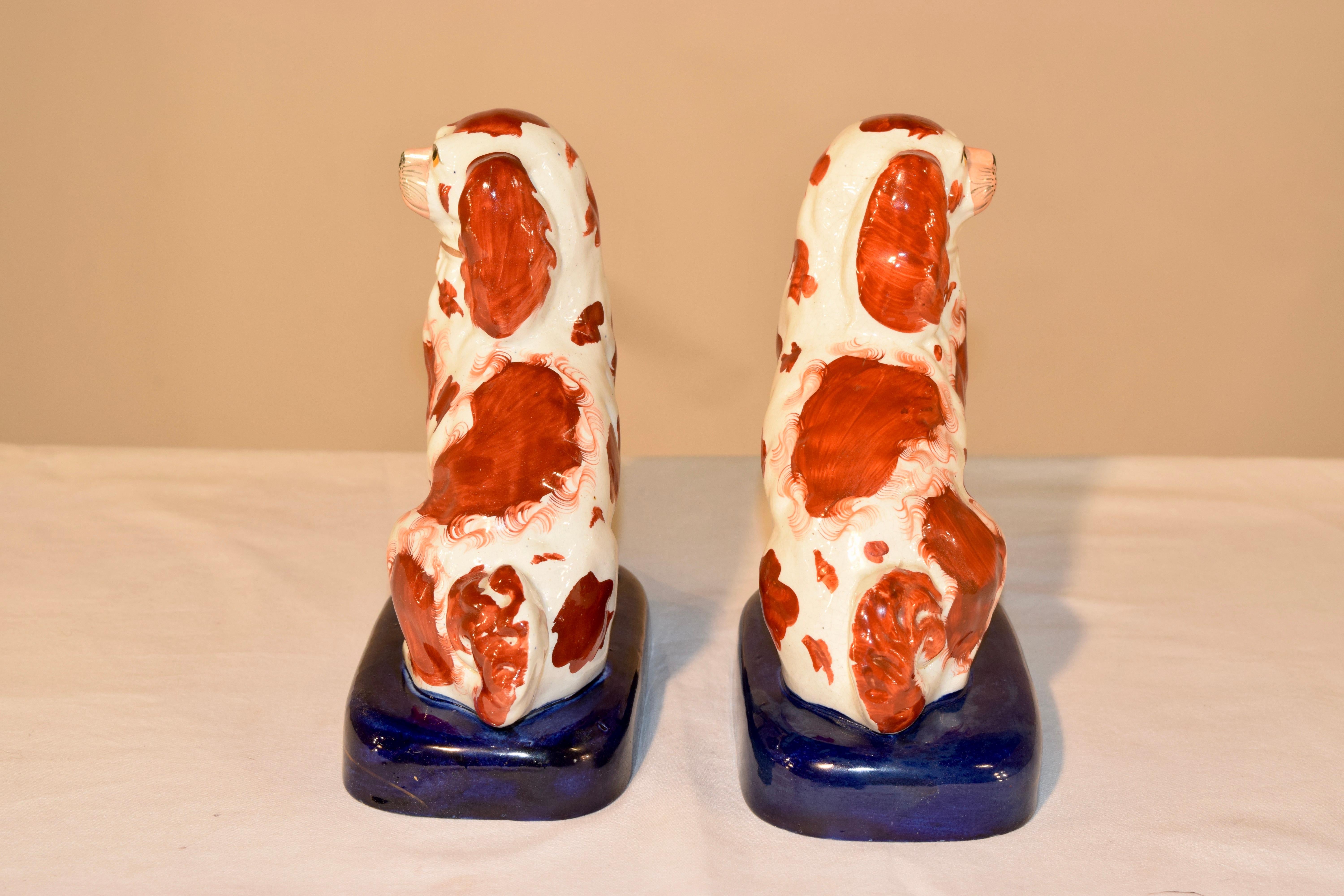 Pair of 19th Century Staffordshire Spaniels on Bases In Good Condition For Sale In High Point, NC
