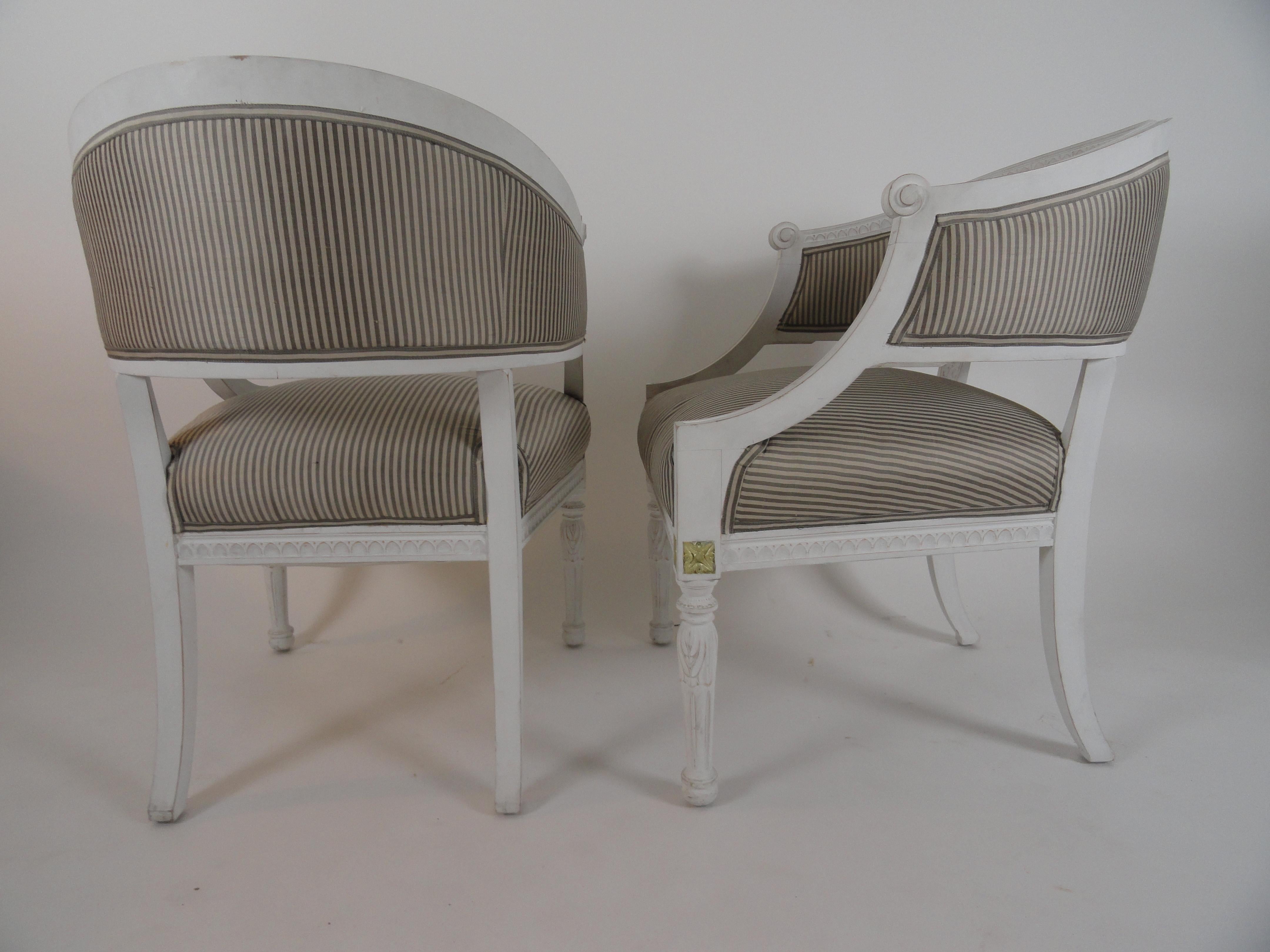 Very nice pair of 19th century Swedish armchairs in excellent condition. Newer painted finish, including silver highlight on carved detail. Procured from Angie Tyner Antiques in Atlanta, GA.