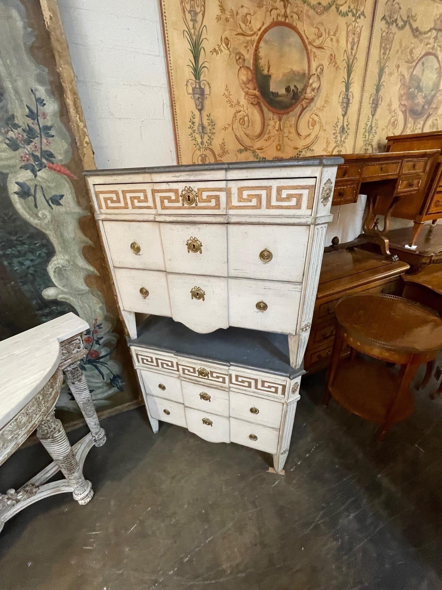 Lovely pair of 19th century Swedish carved and painted chests with Greek Key pattern. Very fine patina and three drawers for storage. A stylish pair for a variety of decors!