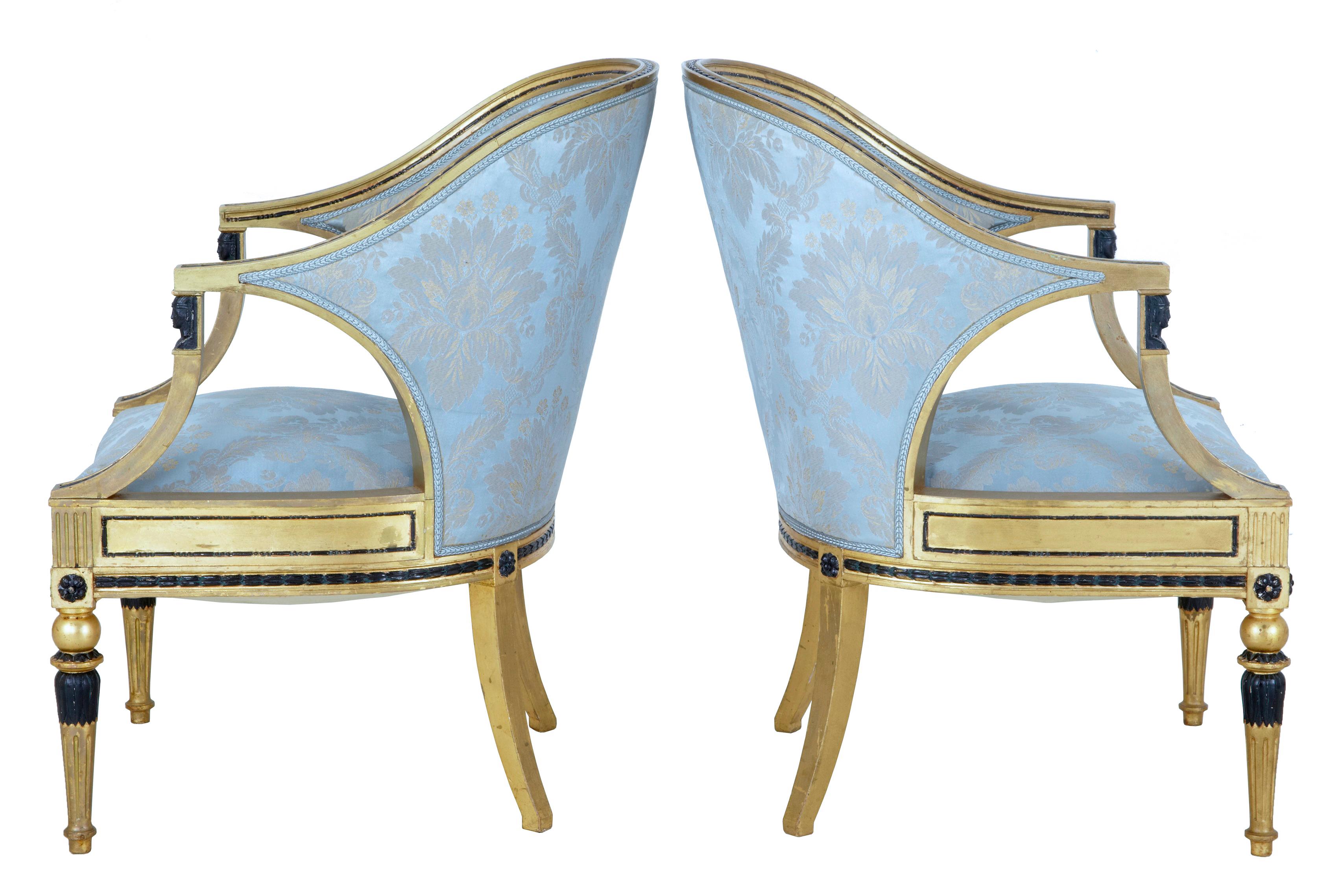Pair of 19th century gothenburg gilt armchairs circa 1870.

Fine quality pair of Swedish gothenburg gilt armchairs circa 1870. Slipper like shaped backs, the shaped arms supported by ebonized egyptian influenced mounts. Ebonized leaves flow down