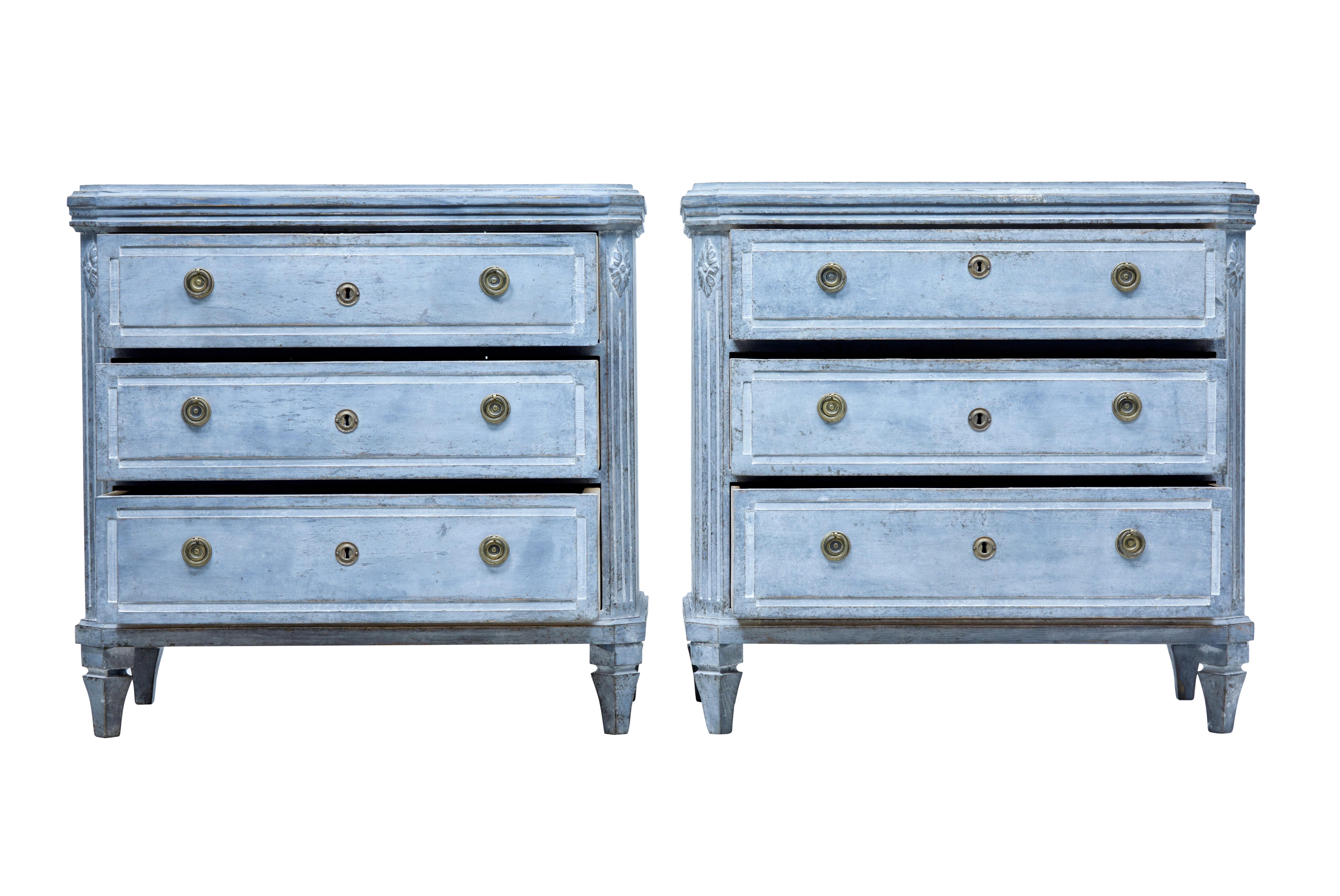 Fine pair of Gustavian inspired painted chest of drawers, circa 1870.

Three drawers with brass ring handles and escutheon, chanelled drawer fronts. Canted corners with applied molding and fluted detail.

Later paint which has now taken on a