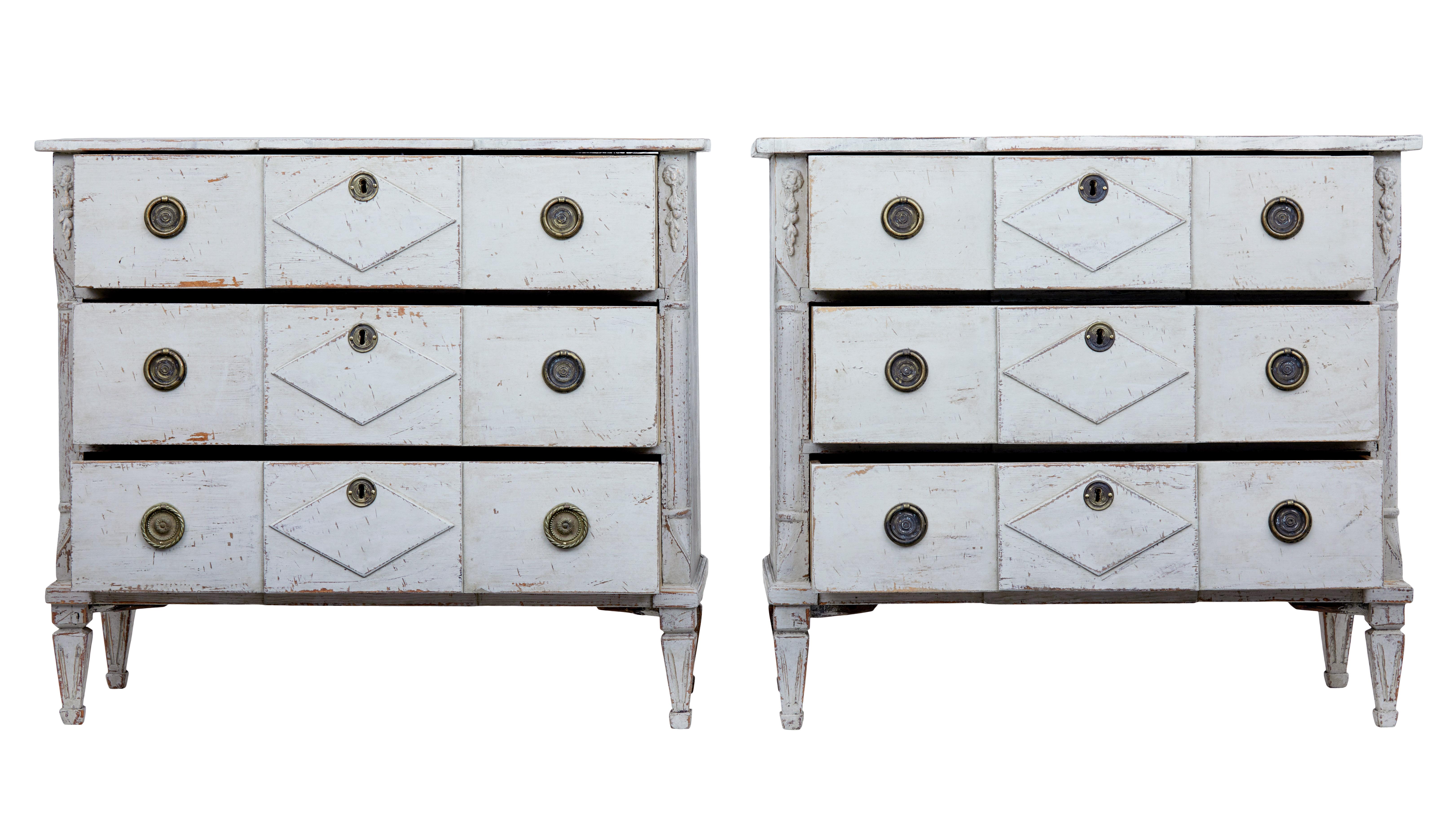 Fine pair of Swedish painted commodes circa 1870.

Good quality pair of commodes, 19th century in later paint. 3 drawers with shaped drawer fronts. Canted corners with carved and applied detailing.

Faux marble hand painted top surface, standing