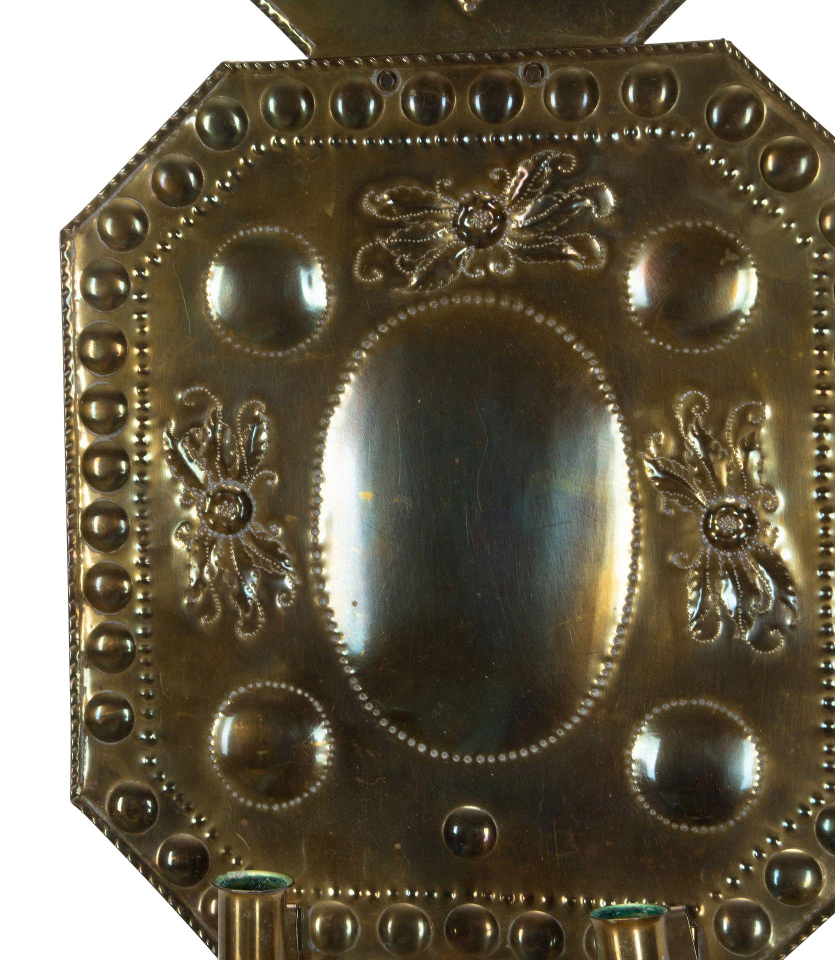 Pair of 19th Century Swedish pressed brass wall lights.
With a circle and heart design.
Circa 1880.