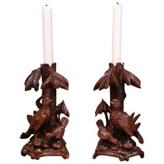 Antique Pair of 19th Century Swiss Black Forest Carved Walnut Candlesticks