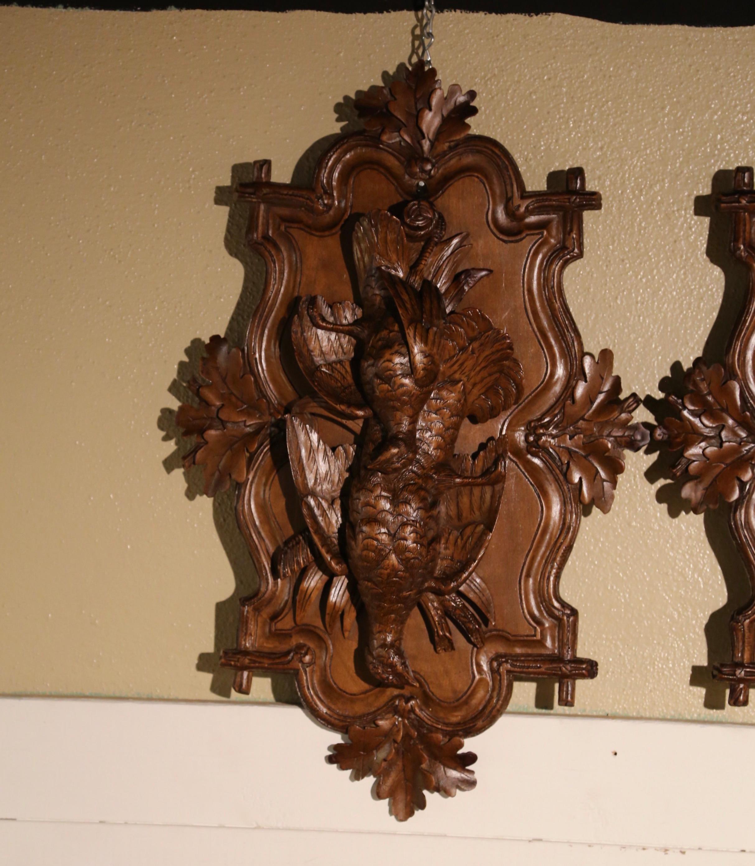 Hand-Carved Pair of 19th Century Swiss Black Forest Carved Walnut Hunt Trophies Sculptures For Sale