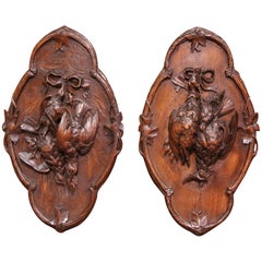 Pair of 19th Century Swiss Black Forest Carved Walnut Hunt Trophies Sculptures