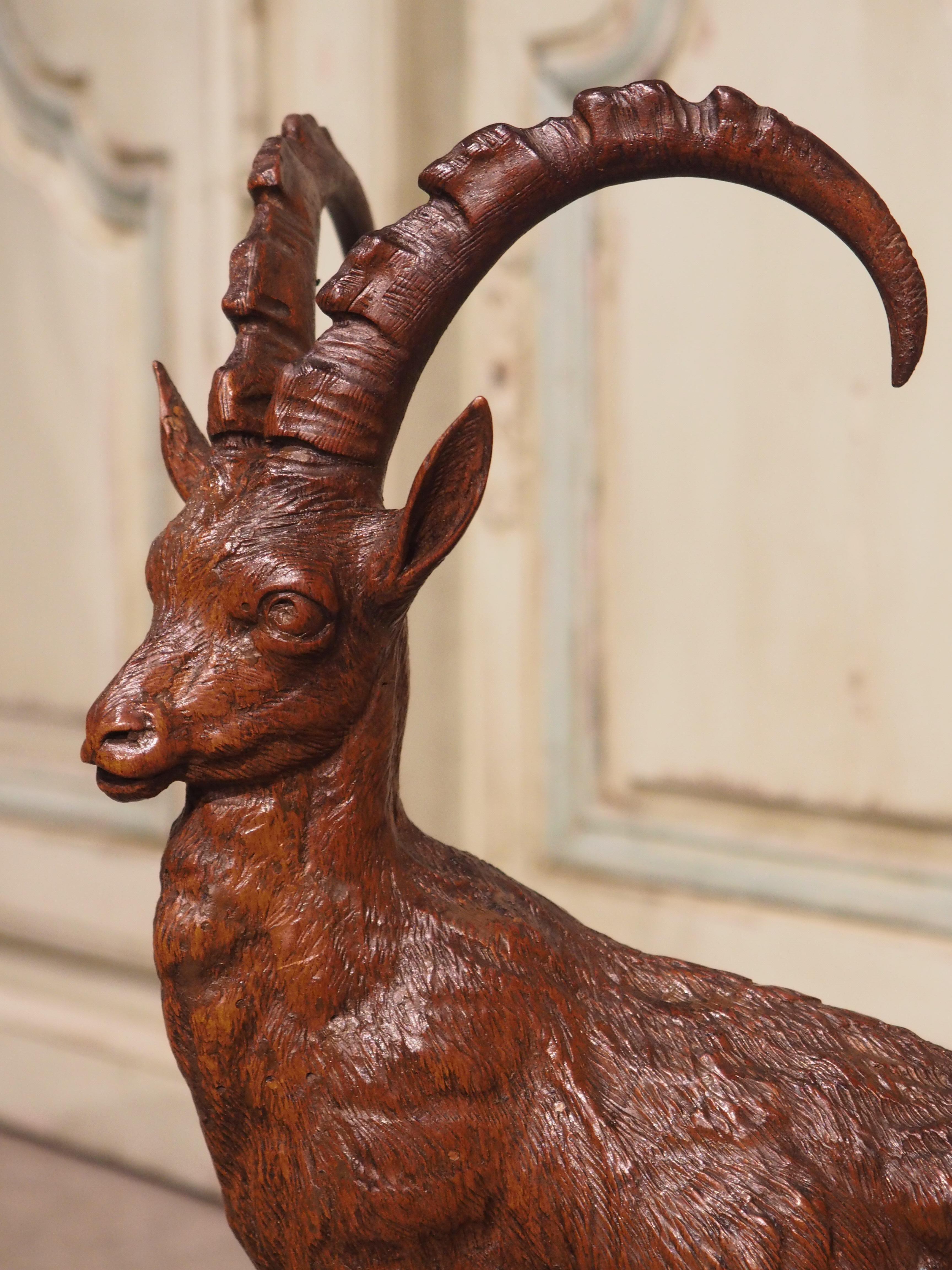Hand-Carved Pair of 19th Century Swiss Black Forest Ibexes in Carved Lindenwood