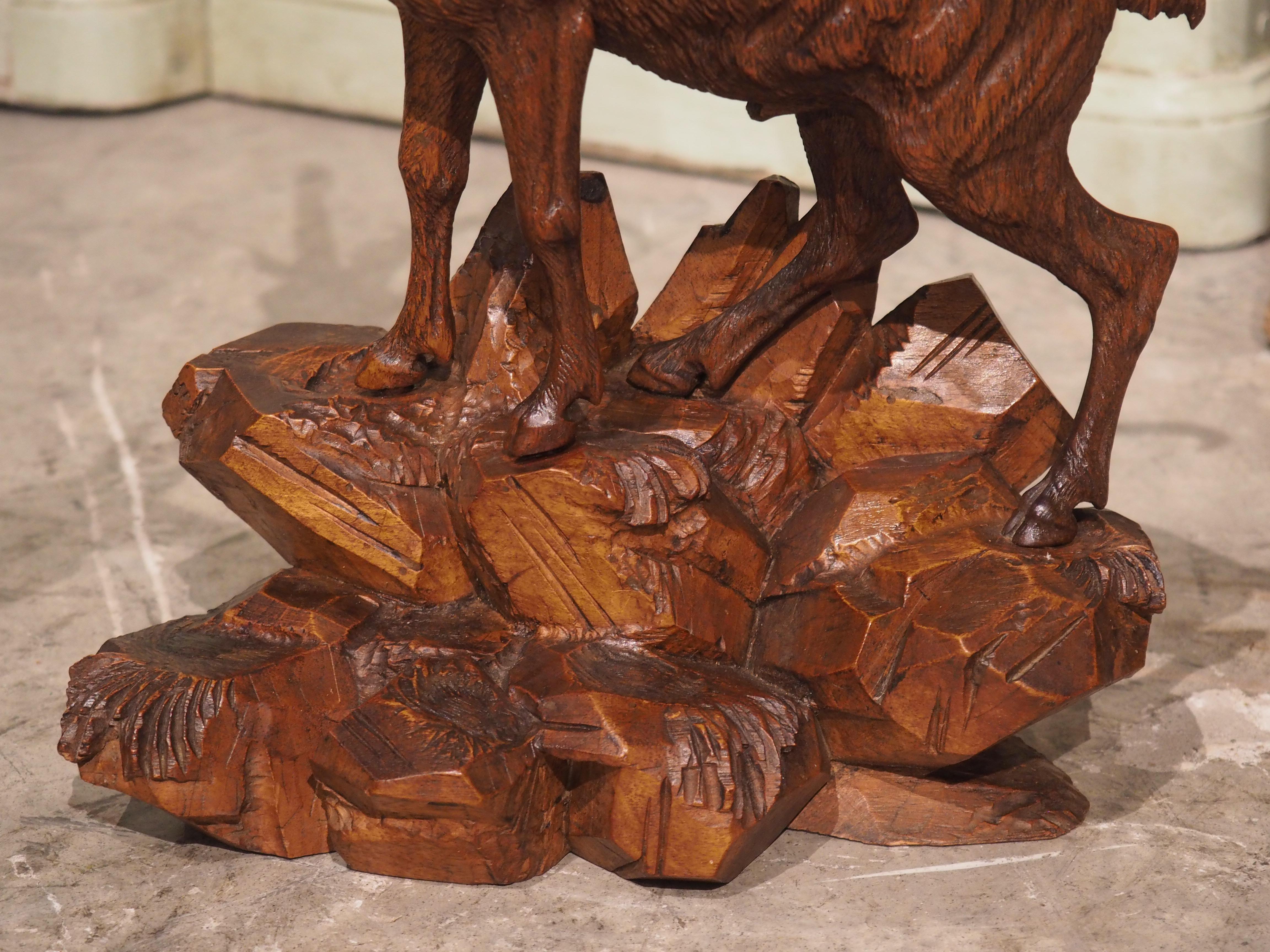 Pair of 19th Century Swiss Black Forest Ibexes in Carved Lindenwood In Good Condition In Dallas, TX